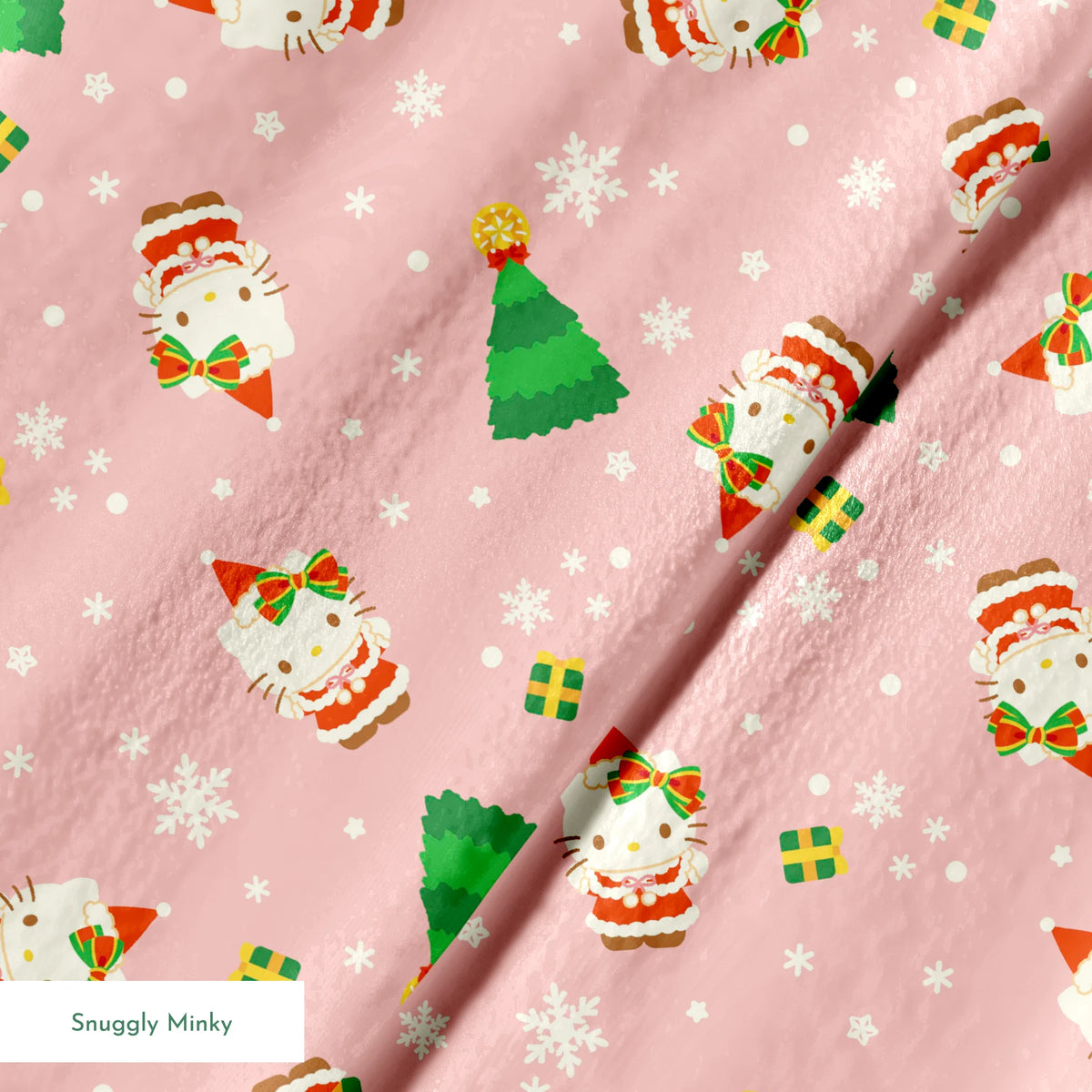 Hello Kitty® Christmas Tree Toss on Pink Fabric