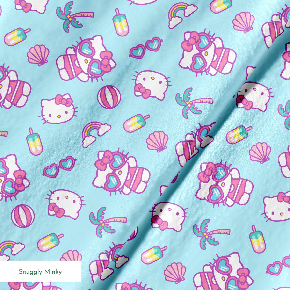 Hello Kitty® Beach Day Fun on Blue Fabric
