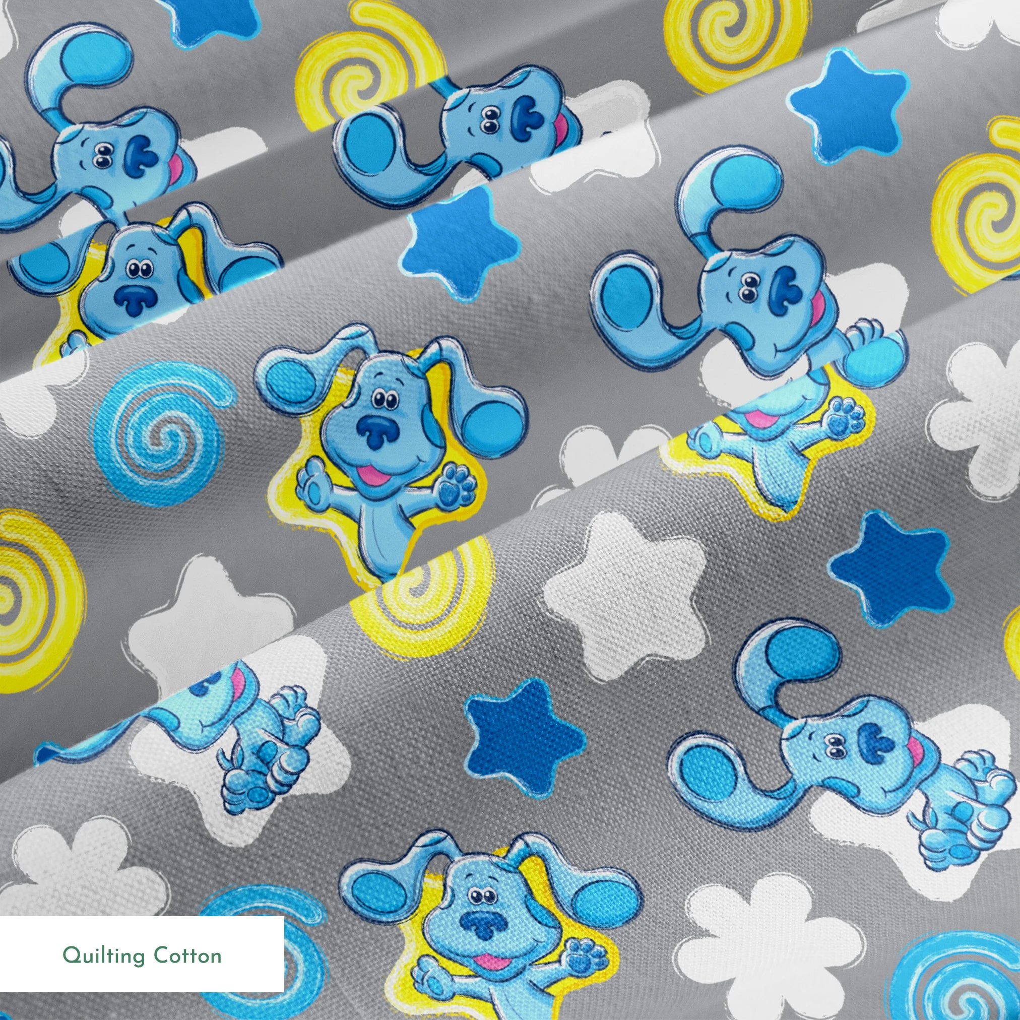 Blue cartoon elephants with stars, swirls, and clouds pattern on gray background springs quiltingcotton texture