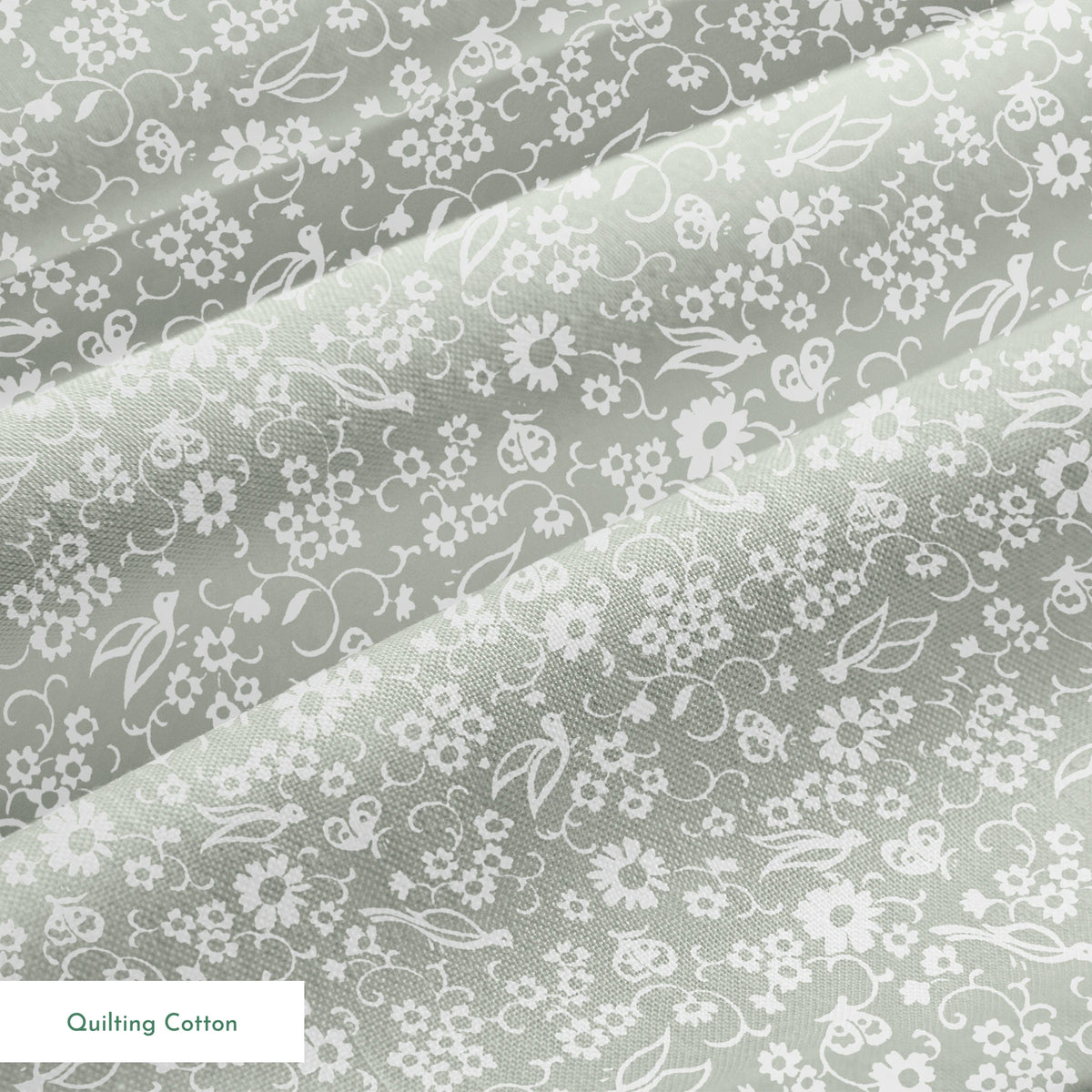 White vintage-style bird and floral silhouettes on a soft gray background. springs quiltingcotton texture