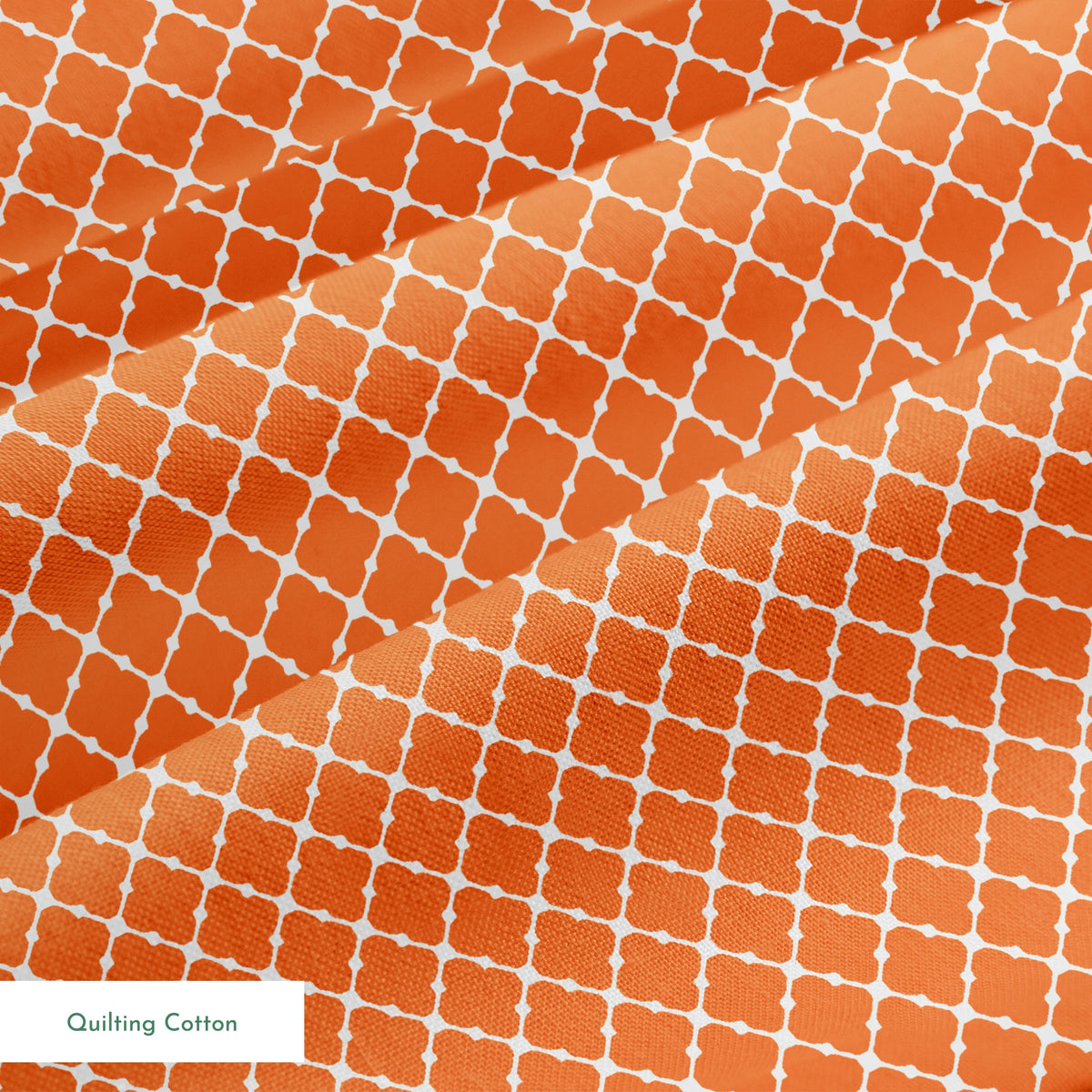 Burnt Orange and white quatrefoil pattern with smooth lattice design on orange background springs quiltingcotton texture