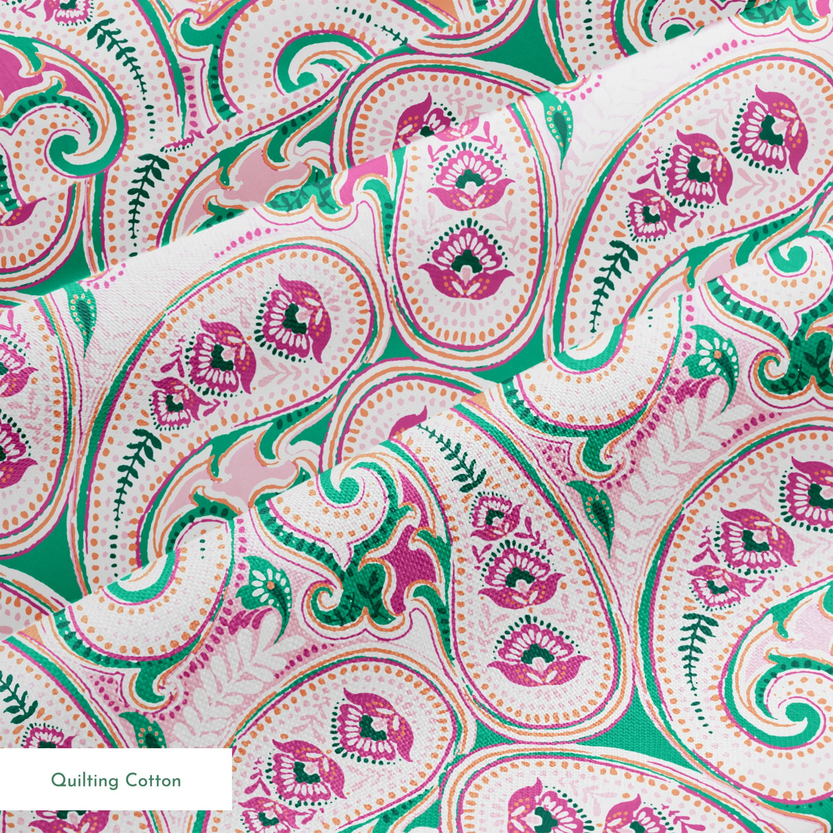 Colorful paisley pattern with swirling teardrop shapes in pink, green, and orange on light background springs quiltingcotton texture