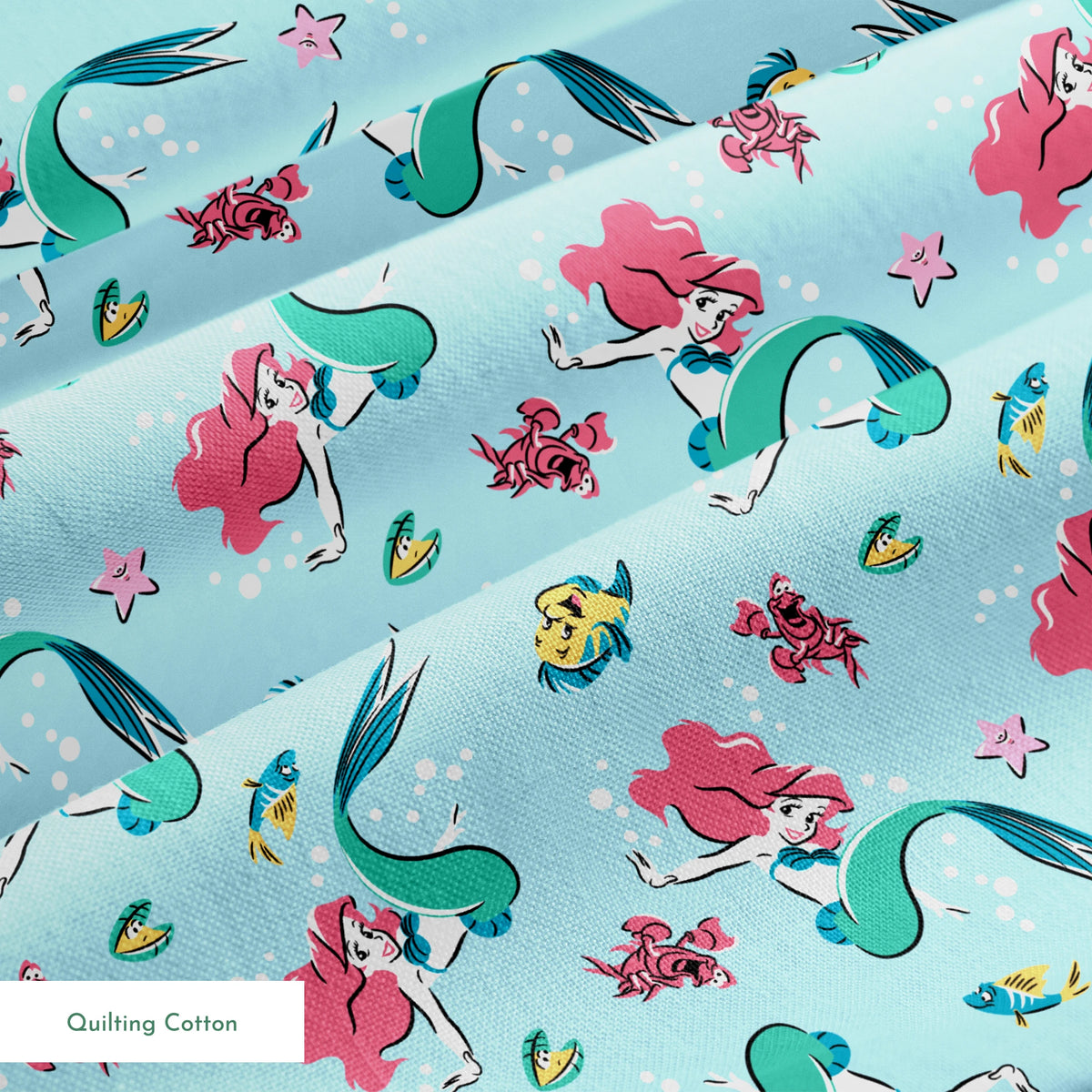 Underwater pattern with colorful mermaids, tropical fish, crabs, and starfish on light blue background springs quiltingcotton texture