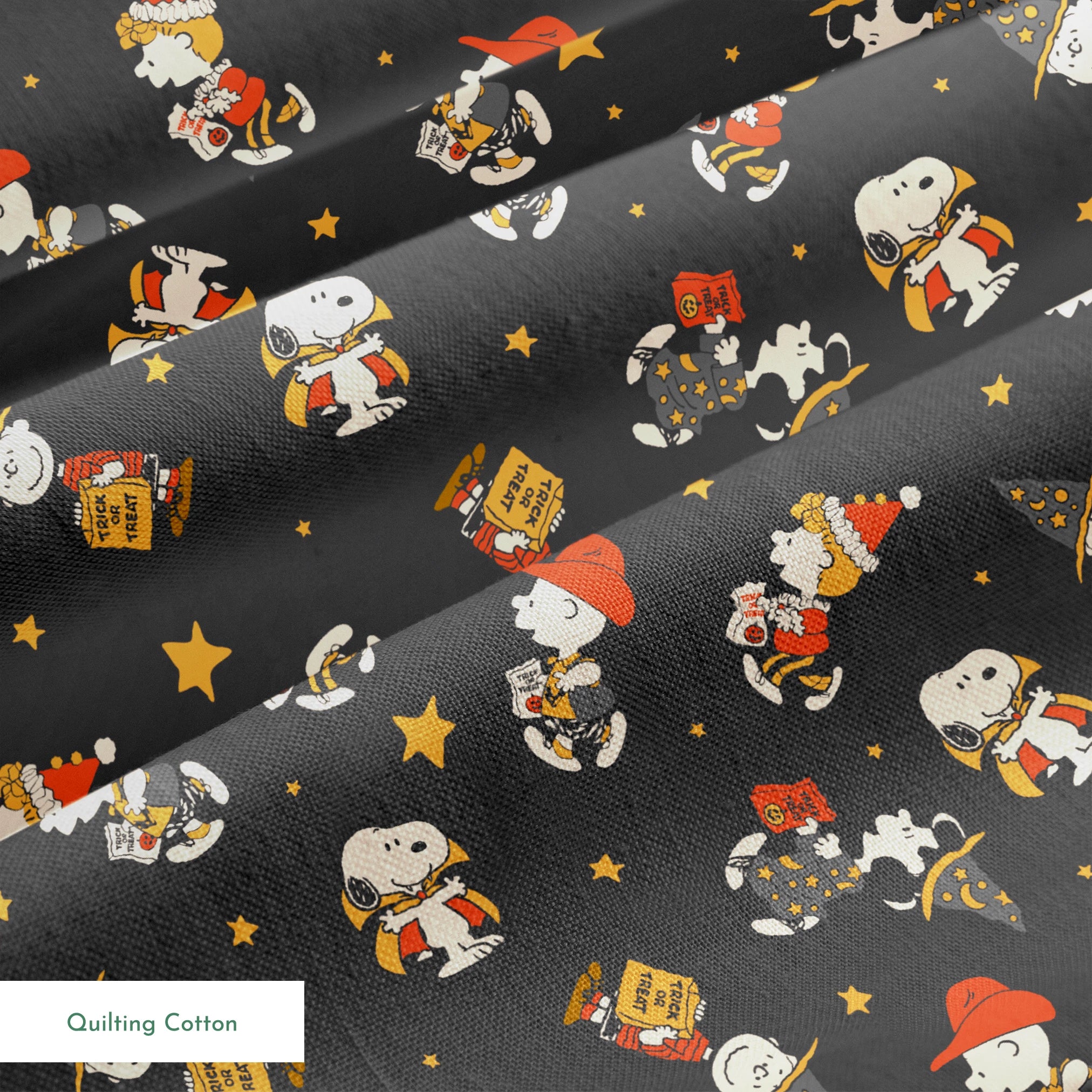 Snoopy cartoon pattern on dark gray background with characters in Halloween costumes and golden stars springs quiltingcotton texture