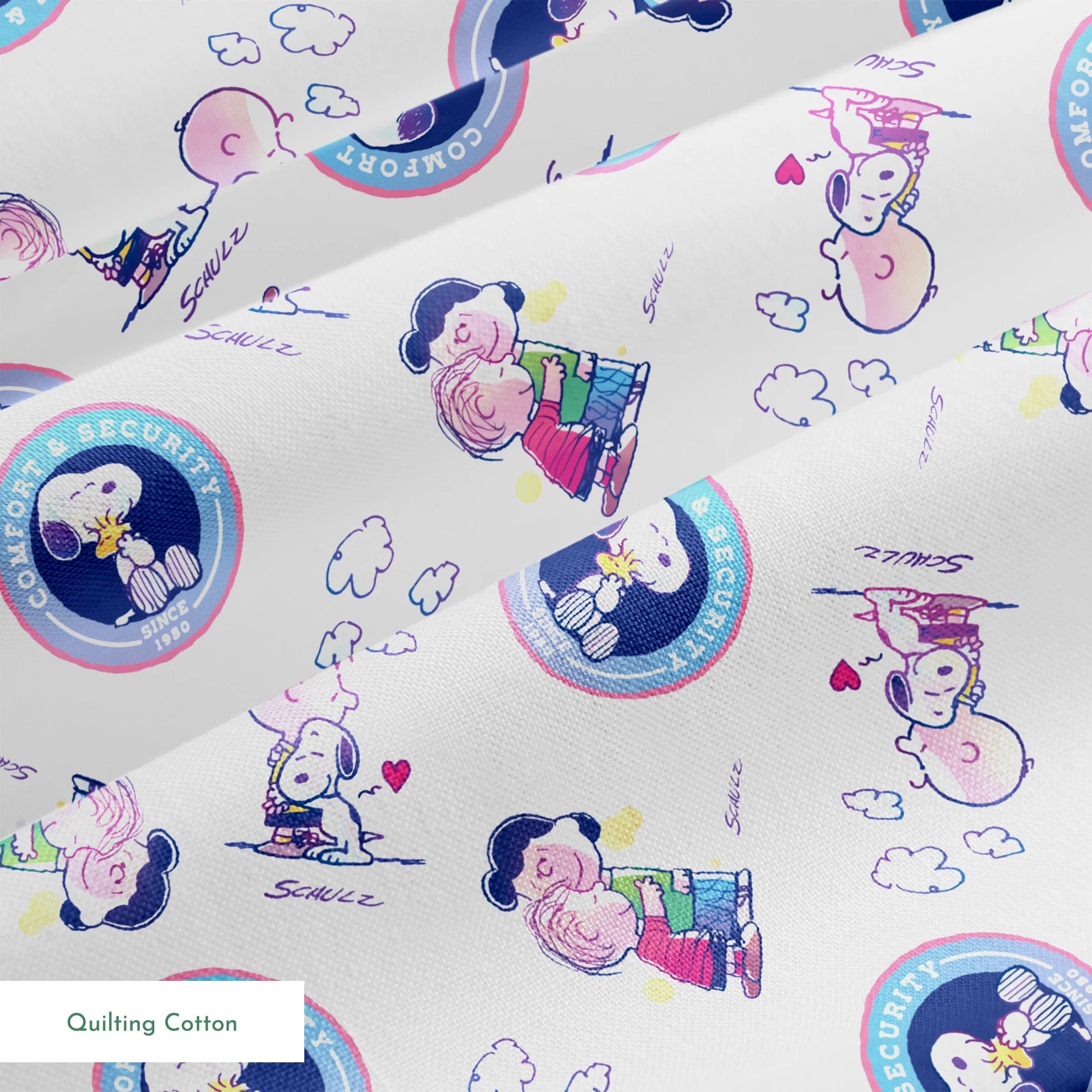 Peanuts cartoon pattern with Snoopy in blue circles and Charlie Brown with books on white background springs quiltingcotton texture