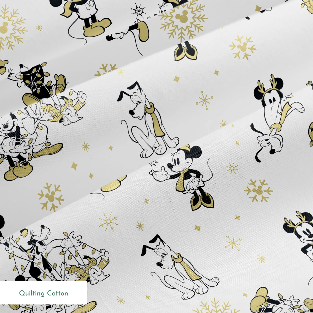 Vintage Disney characters pattern with Mickey, Minnie and Pluto on white background with gold snowflakes springs quiltingcotton texture