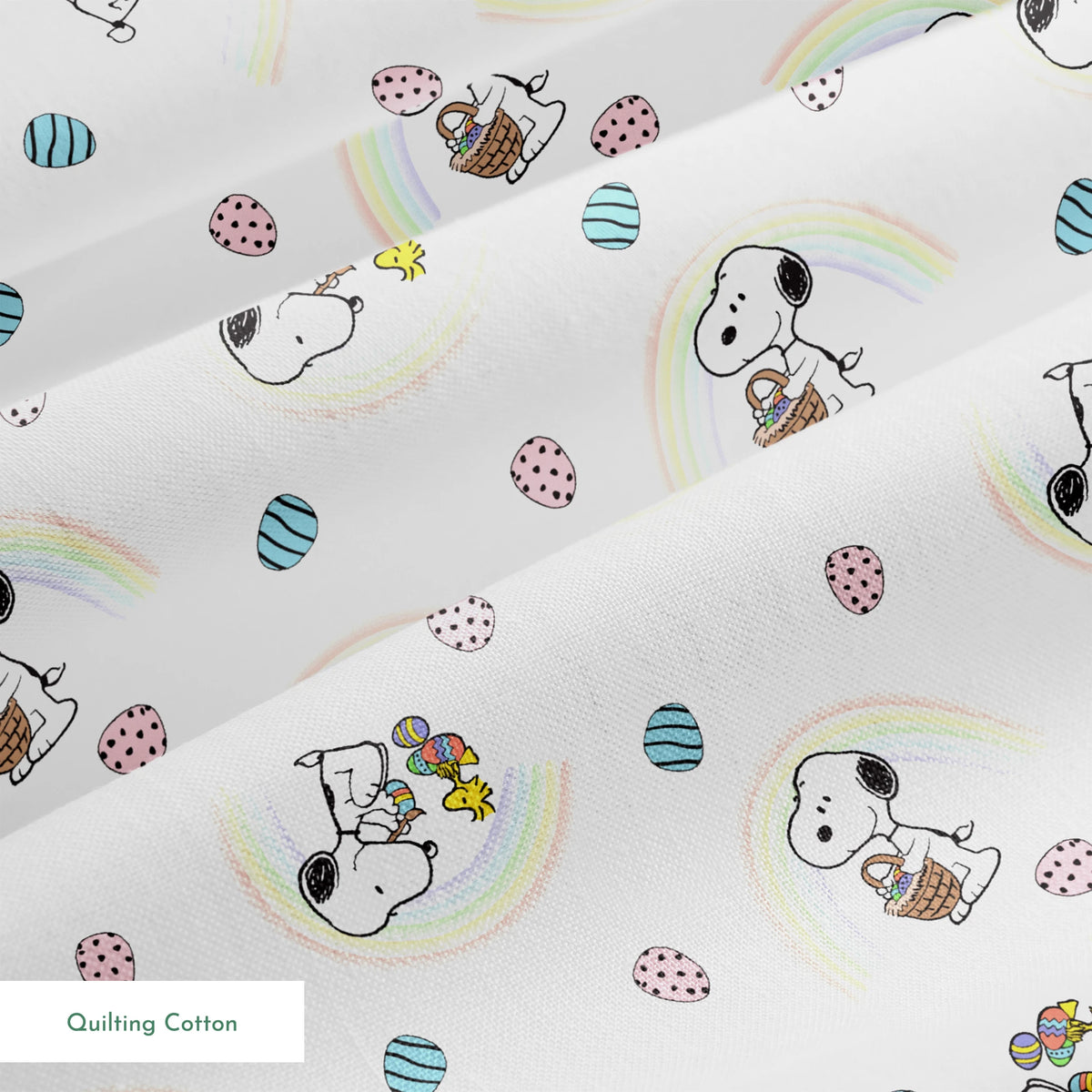 Snoopy pattern with Easter eggs, rainbows, and Woodstock, featuring Snoopy holding flowers and baskets springs quiltingcotton texture
