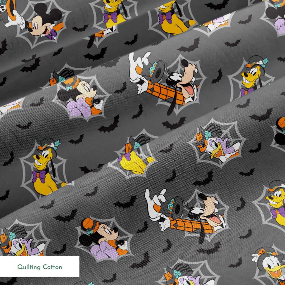 Disney cartoon characters in Halloween costumes on gray background with spider webs and bats springs quiltingcotton texture