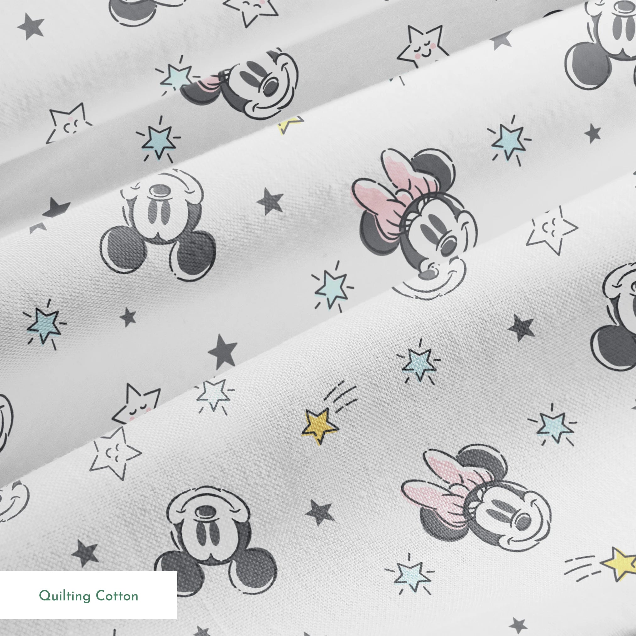 Mickey and Minnie Mouse pattern with stars on light gray background springs quiltingcotton texture