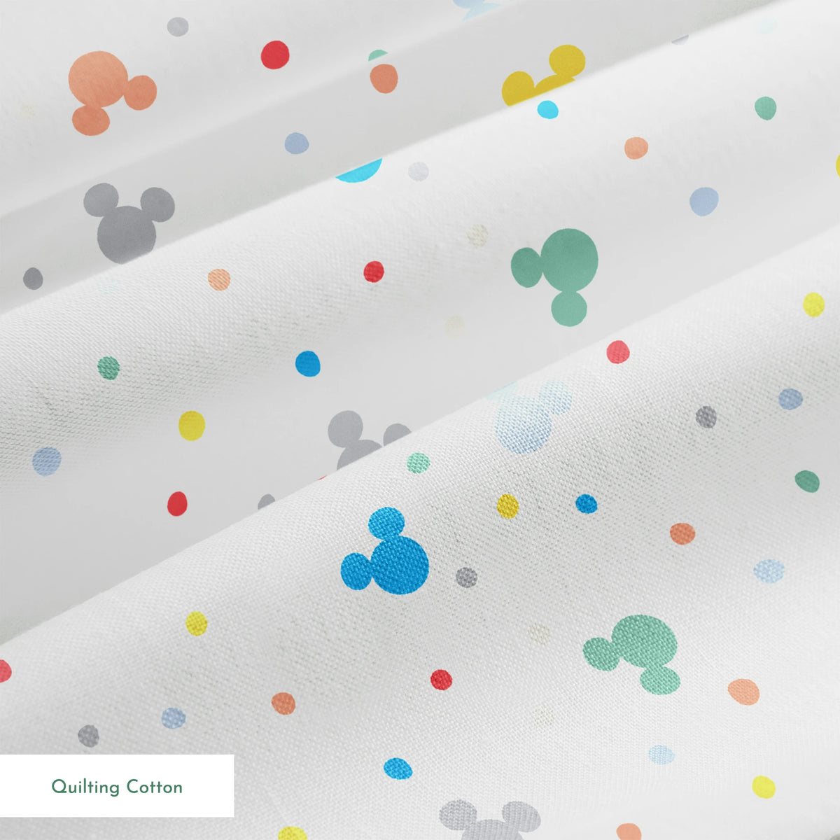 Colorful Disney Mickey Mouse silhouette pattern with pastel dots on white background springs quiltingcotton texture