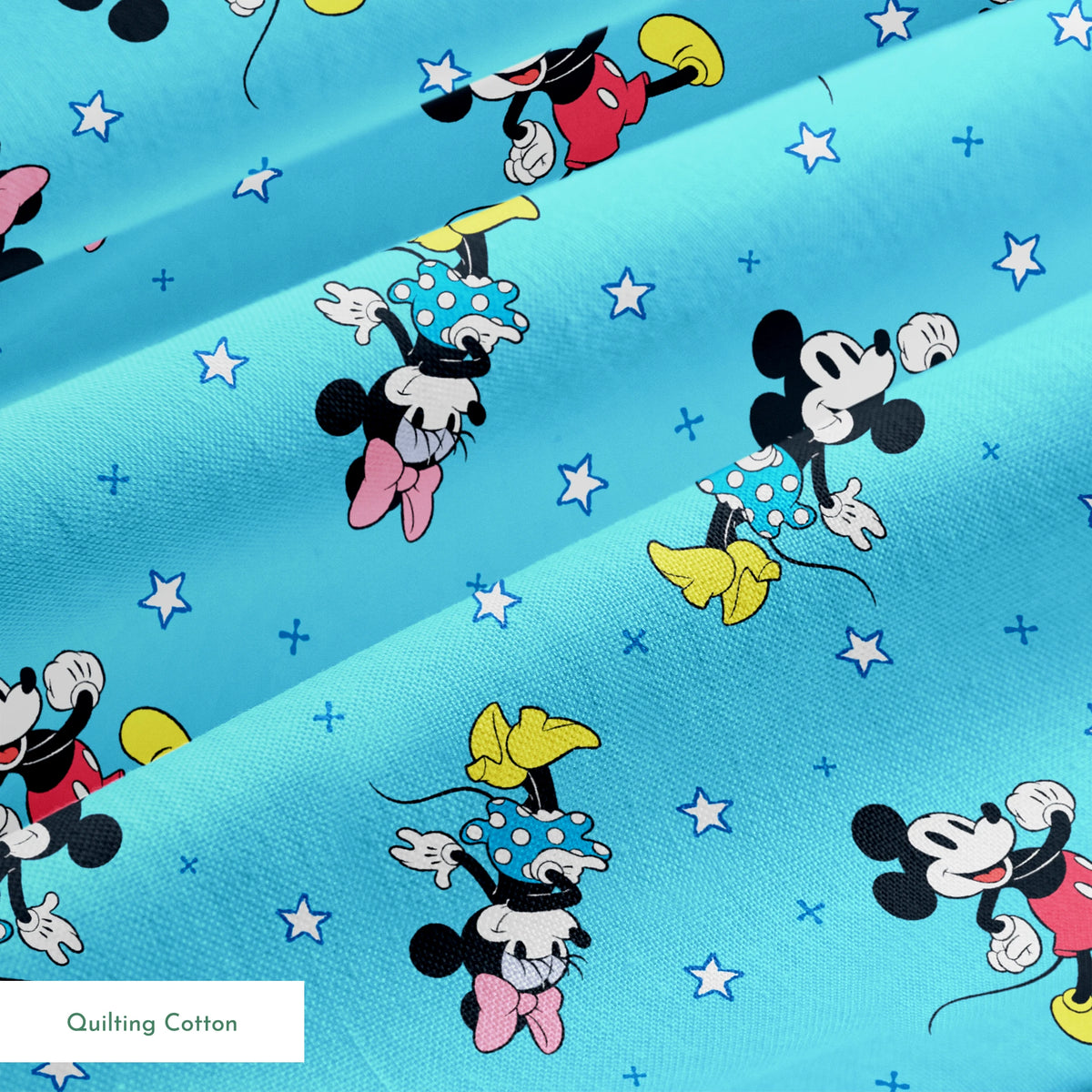 Disney Mickey Mouse and Minnie Mouse characters on light blue background with white stars, pattern design springs quiltingcotton texture