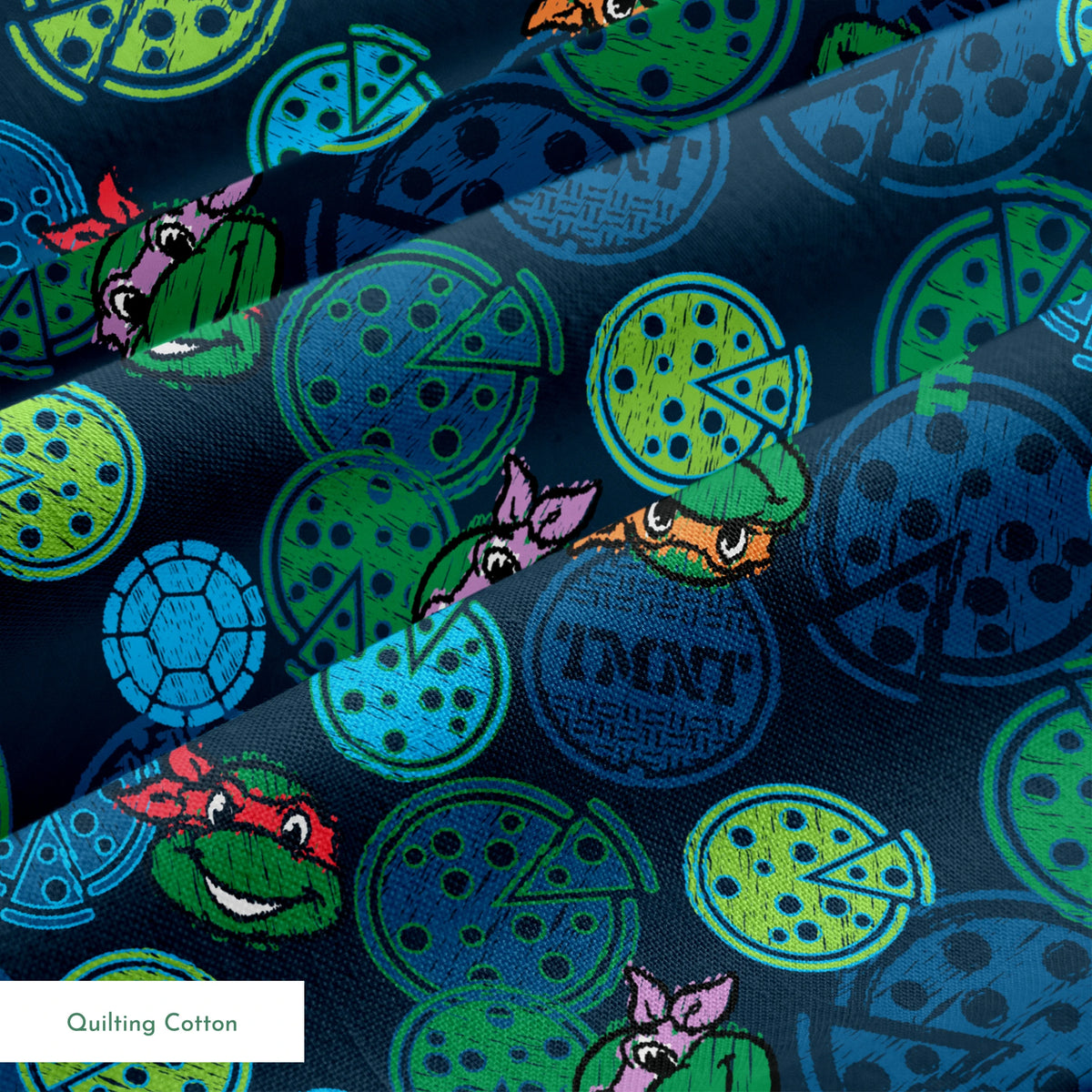 Teenage Mutant Ninja Turtles pattern with cartoon character heads and green/blue pizza circles springs quiltingcotton texture