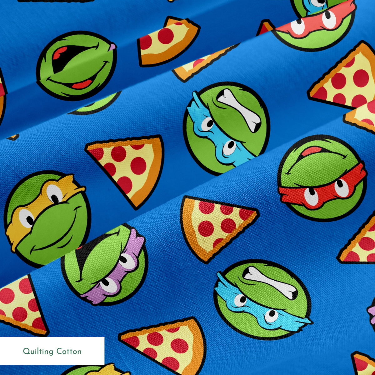 Teenage Mutant Ninja Turtle faces with colored masks and pizza slices pattern on blue background springs quiltingcotton texture