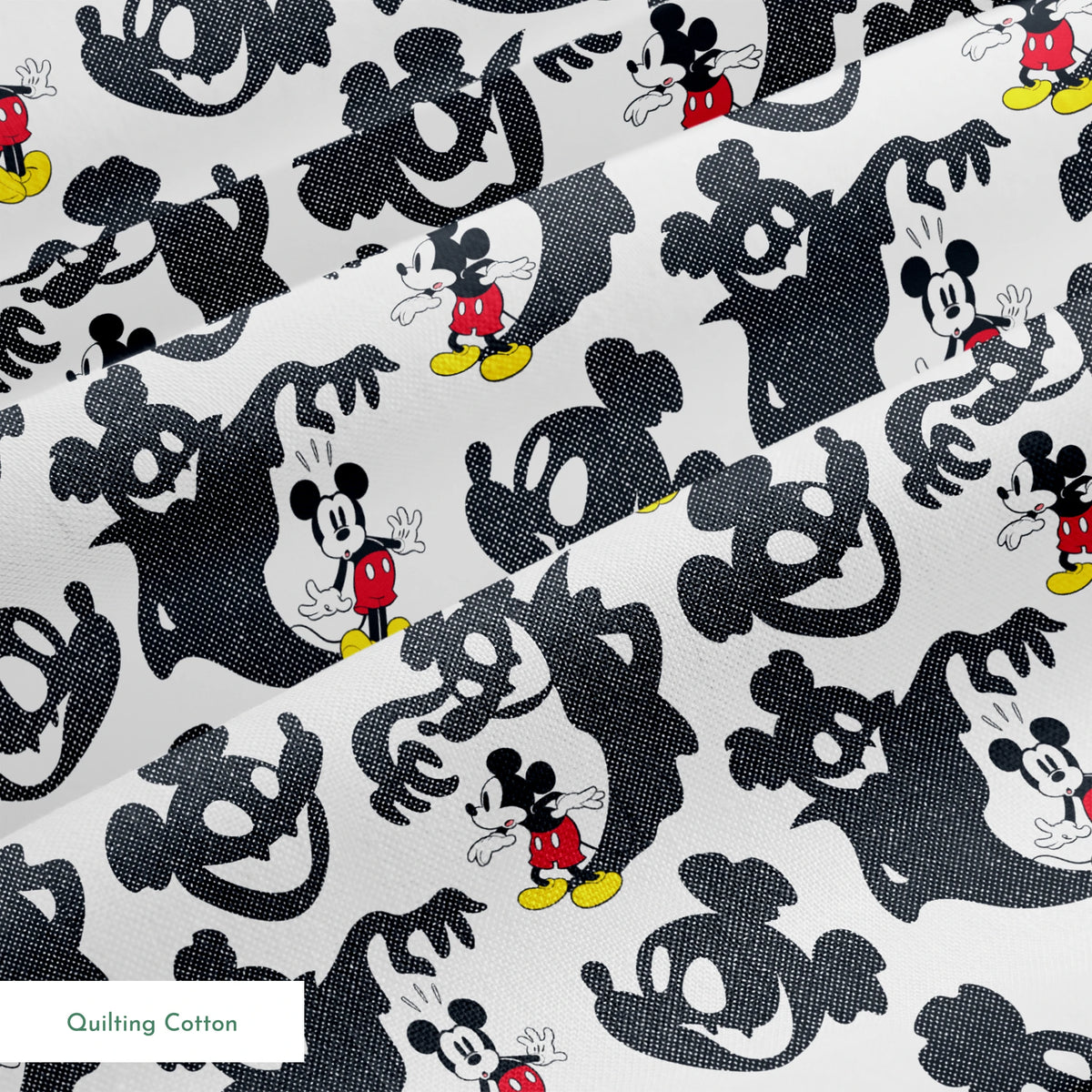 Mickey Mouse pattern with black ghost silhouettes on white background springs quiltingcotton texture