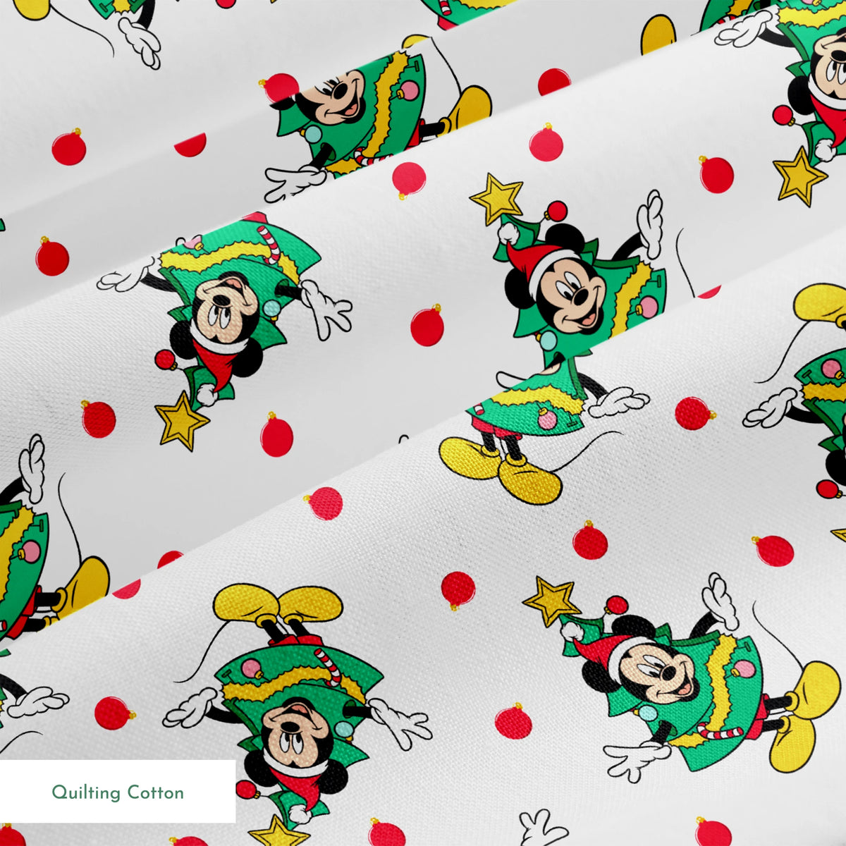 Mickey Mouse in a Christmas tree costume and stars on white background with red dots springs quiltingcotton texture