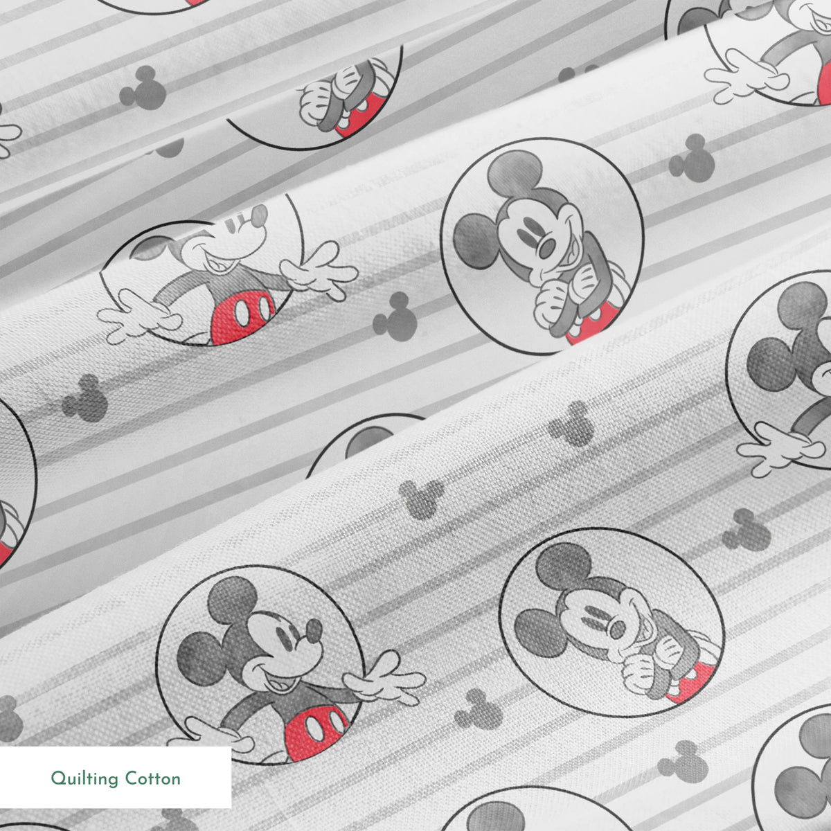 Mickey Mouse pattern on gray striped background with circular character portraits in red, black, and white springs quiltingcotton texture