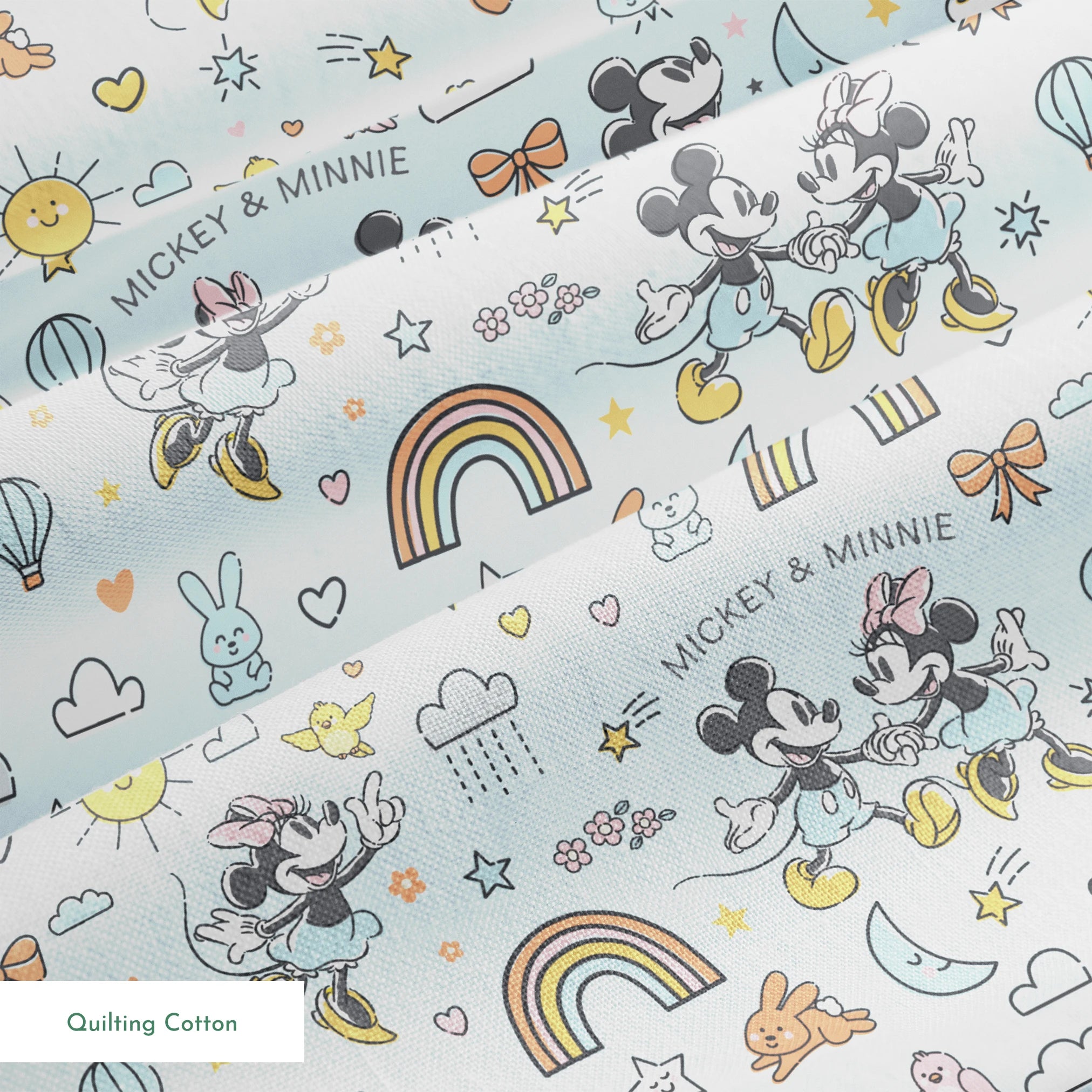 Playful Disney pattern with classic cartoon characters, rainbows, hearts, and whimsical elements on light blue background. springs quiltingcotton texture