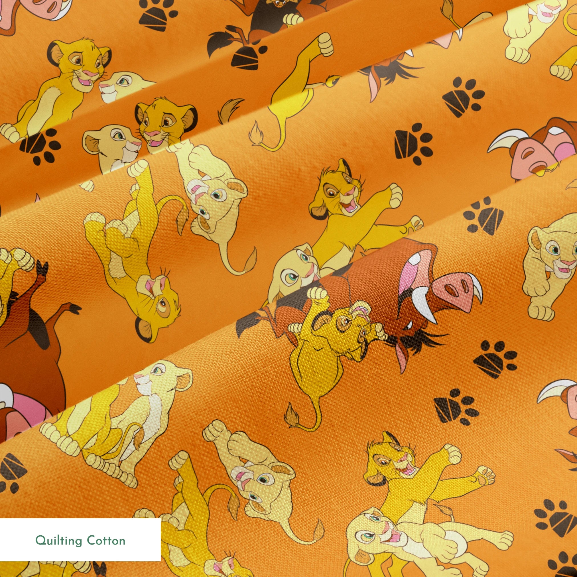 Playful pattern of cartoon cubs in yellow and brown poses on bright orange background with pawprints springs quiltingcotton texture