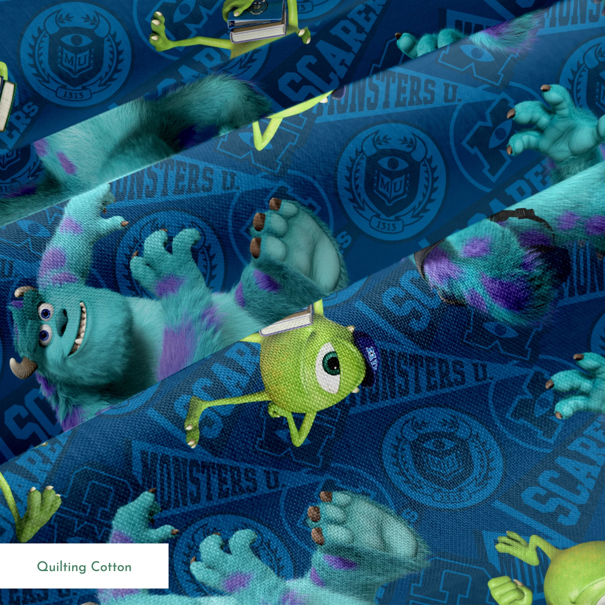Monsters Inc characters pattern with Mike Wazowski and Sully on blue background springs quiltingcotton texture