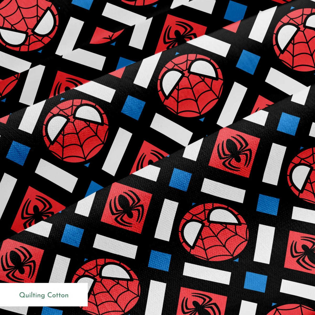 Spider-Man pattern with red masks, spider symbols, webs on black background with white X shapes and blue diamonds springs quiltingcotton texture