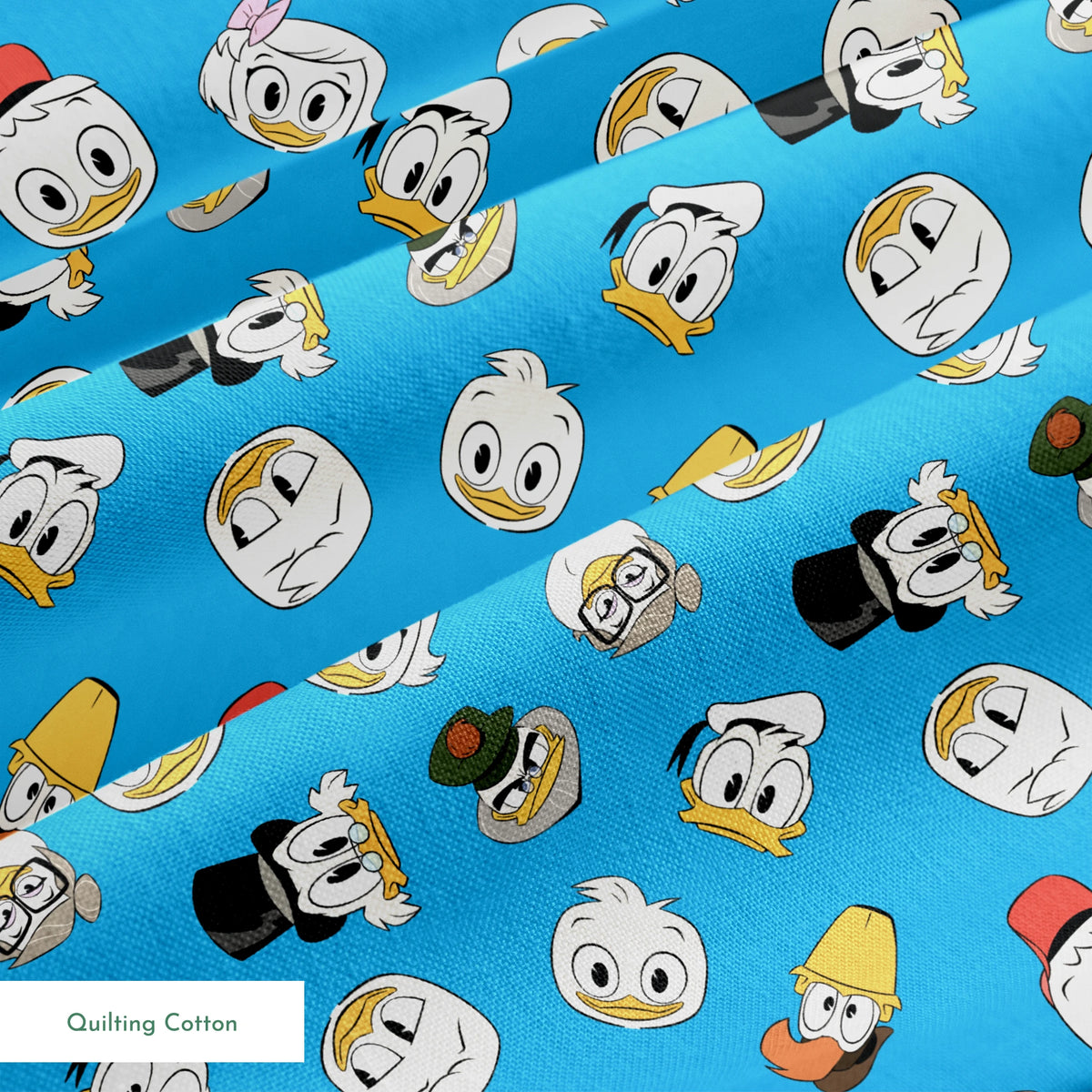 Disney DuckTales Head Toss on Blue | Fabric by the Yard