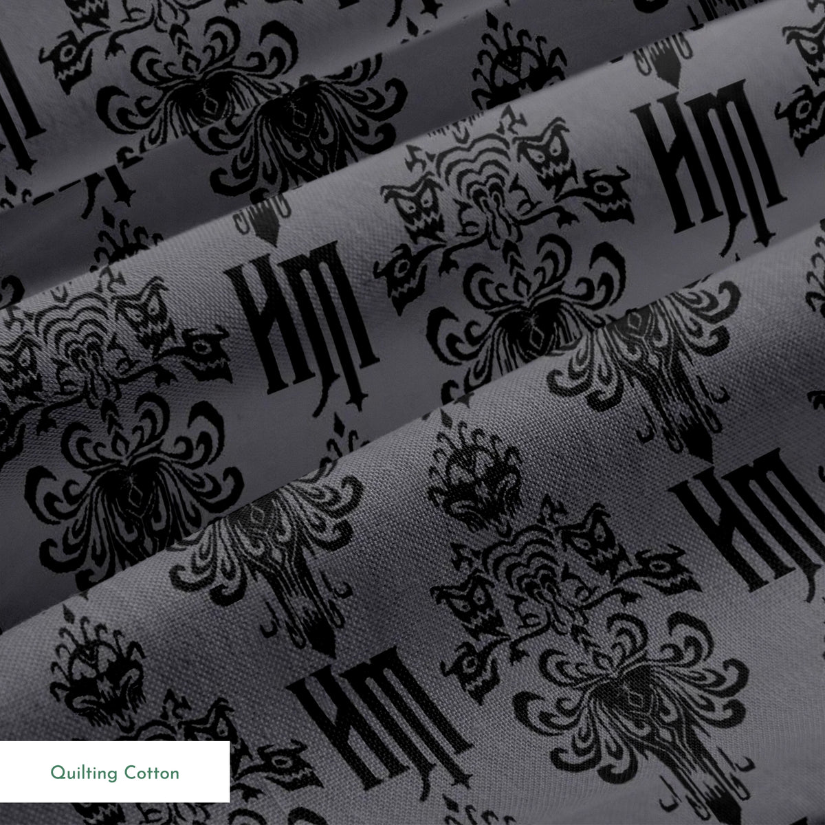 Dark gray background with black ornate damask pattern featuring decorative flourishes and monogram elements springs quiltingcotton texture