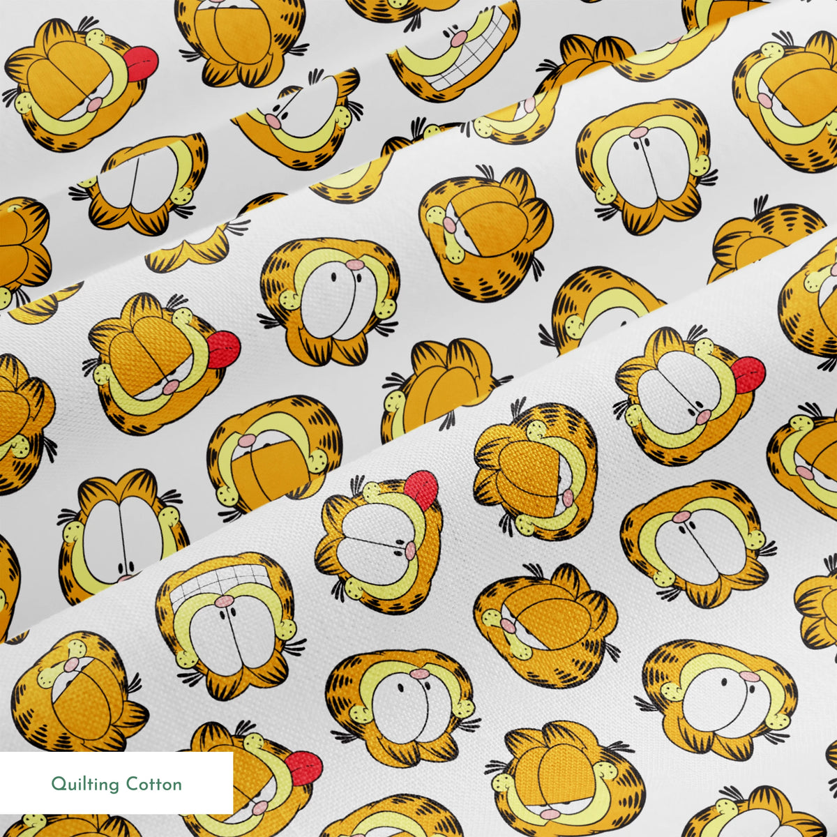Pattern of cartoon cat faces with orange and yellow coloring against white background springs quiltingcotton texture