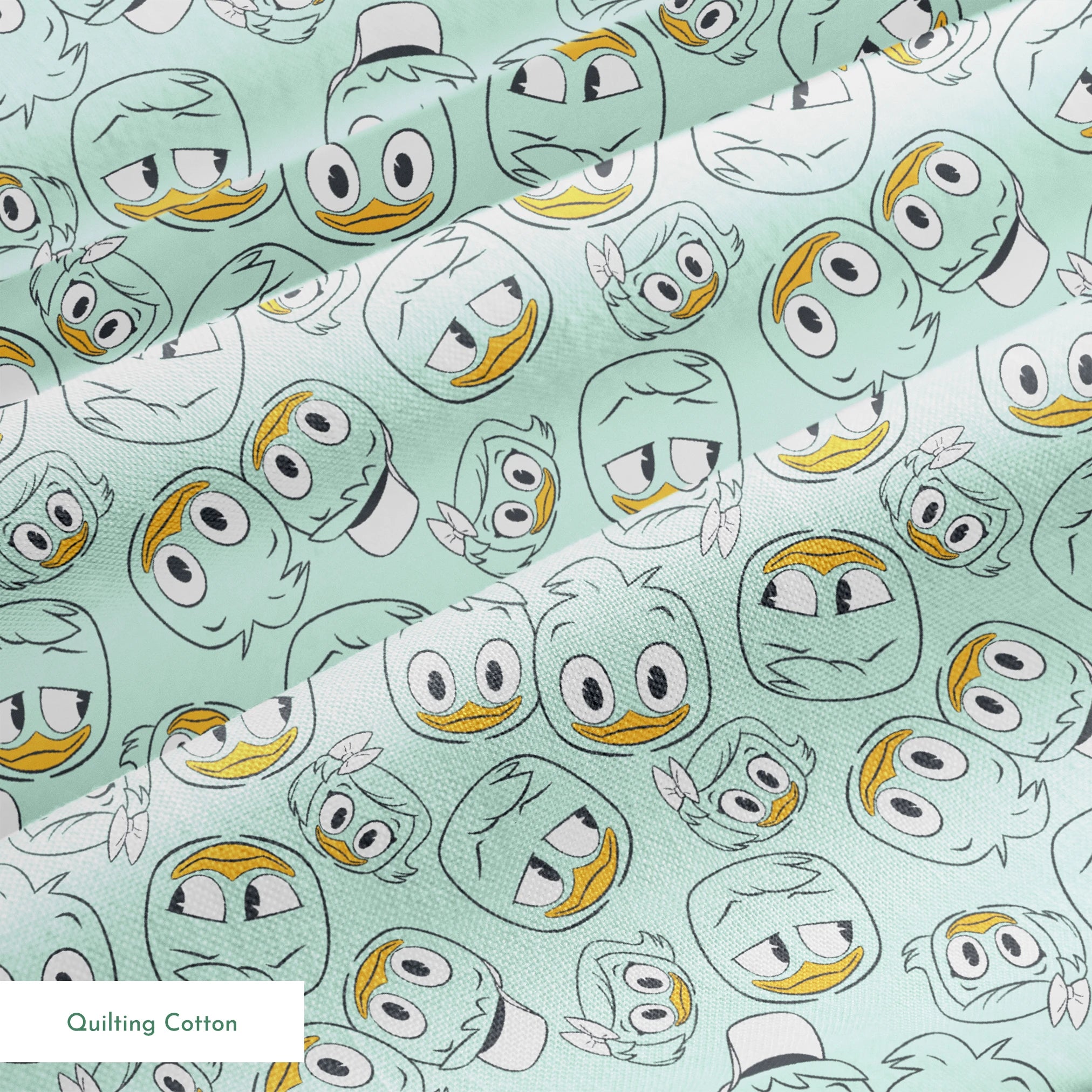 Disney Duck Tales Character Faces on Mint Fabric