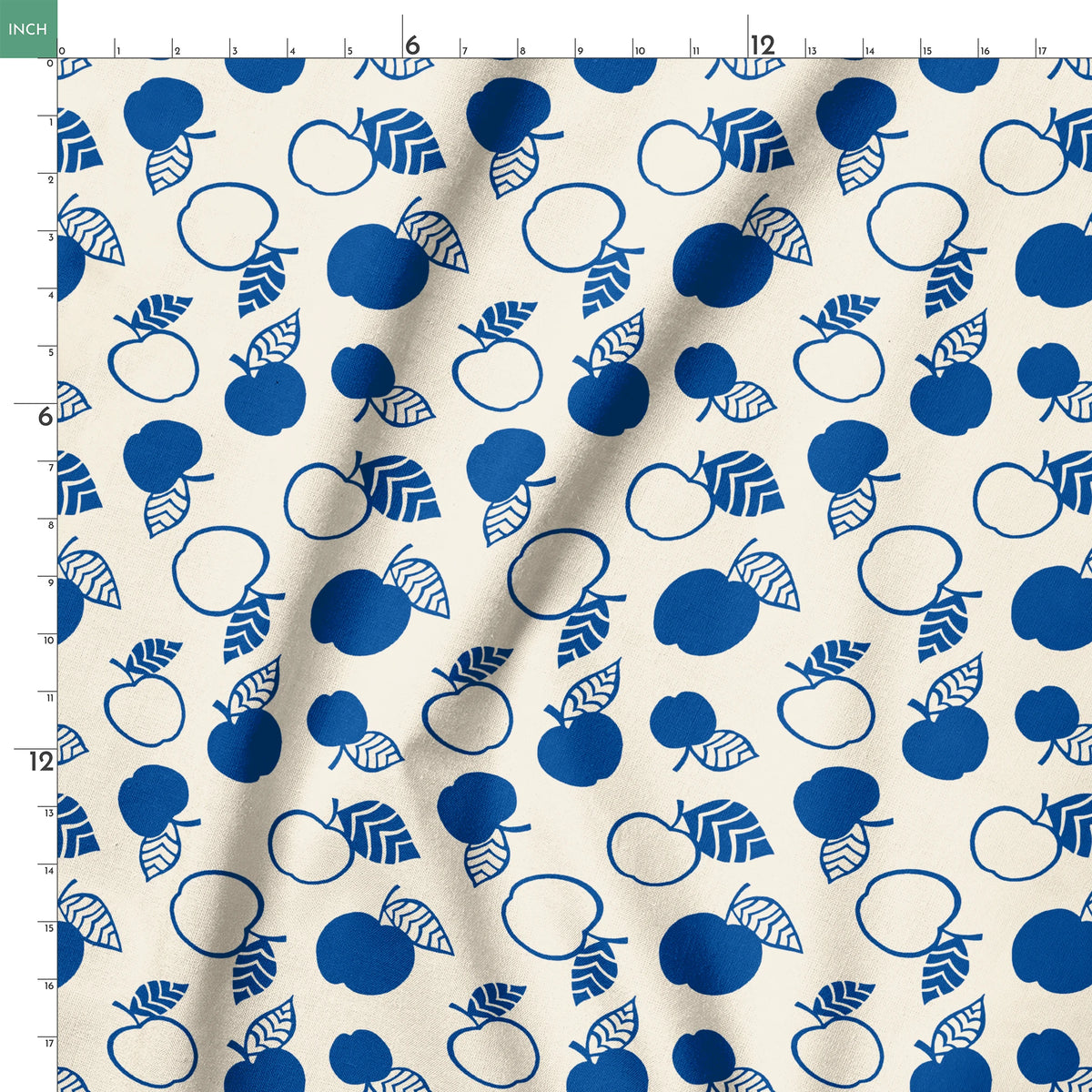 Blue apple illustrations and leaf outlines arranged in a scattered pattern on cream background. springs ruler 18x18