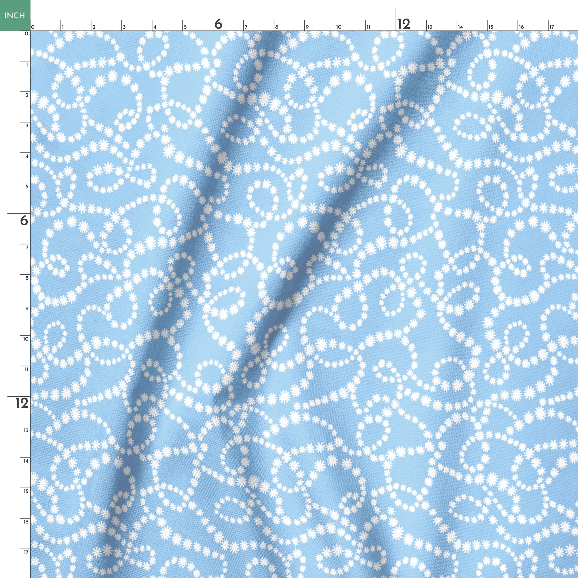Pale blue background with white dotted swirling pattern resembling strings of pearls or bubbles in abstract curves springs ruler 18x18
