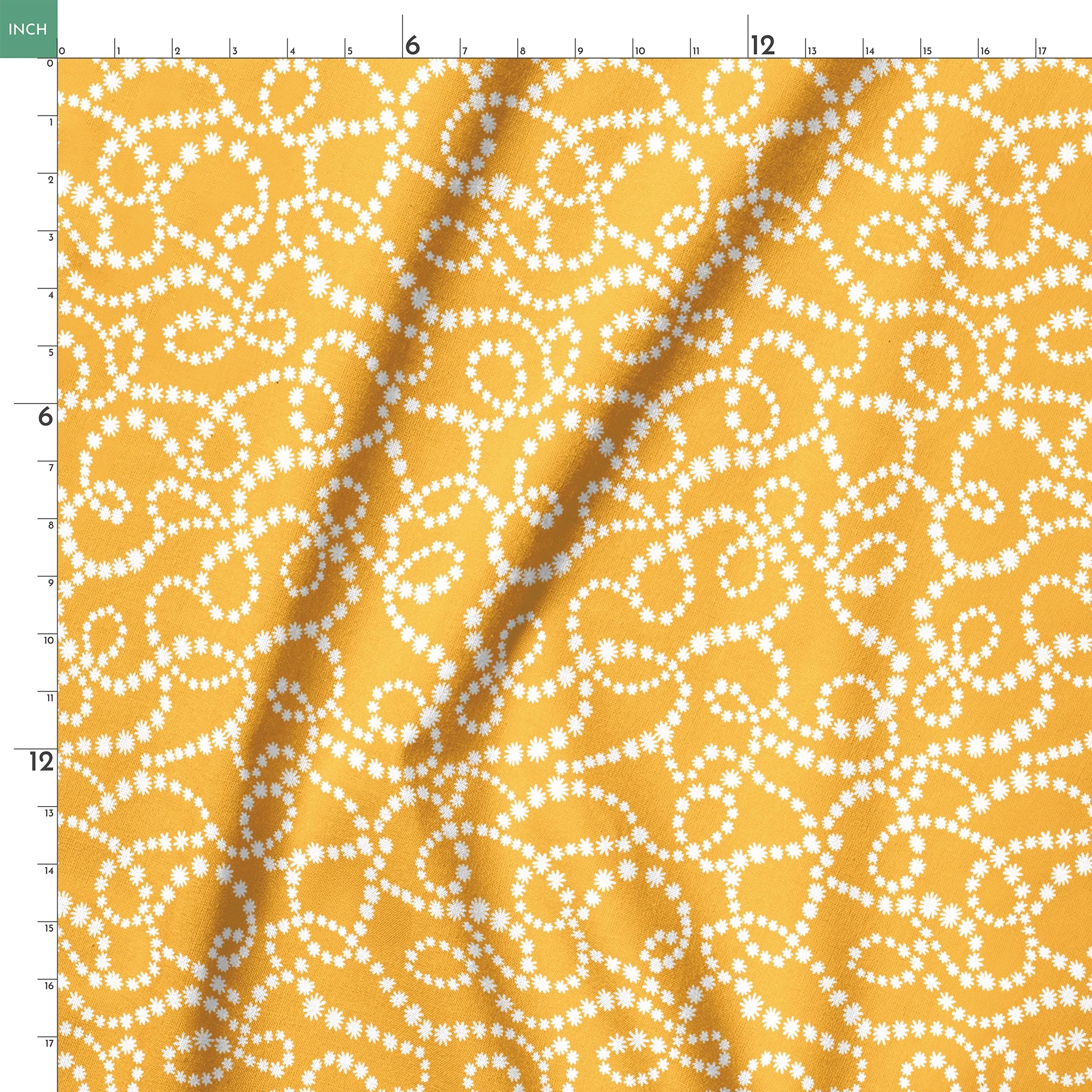 Mustard yellow background with swirling dotted white patterns forming organic circular designs springs ruler 18x18