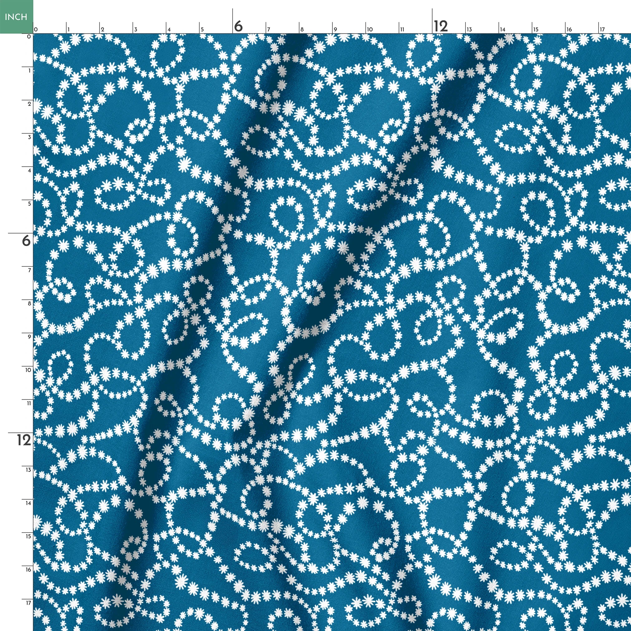 Dotted white swirling patterns on deep teal blue background creating abstract curved designs springs ruler 18x18