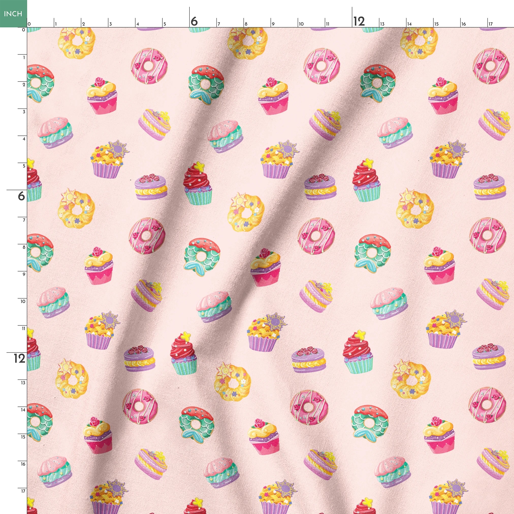 DIsney Princess-inspired dessert pattern with donuts, cupcakes, and macarons on a light pink background springs ruler 18x18