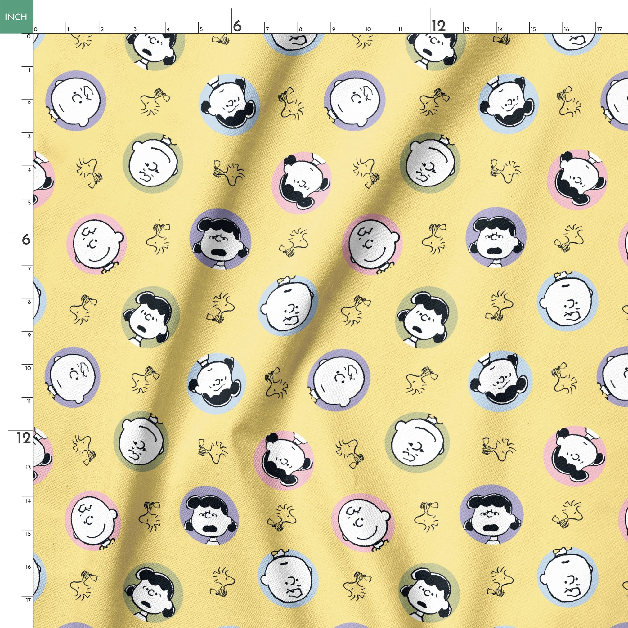 Peanuts characters pattern with Charlie Brown and friends in circular frames on yellow background with Woodstock silhouettes springs ruler 18x18
