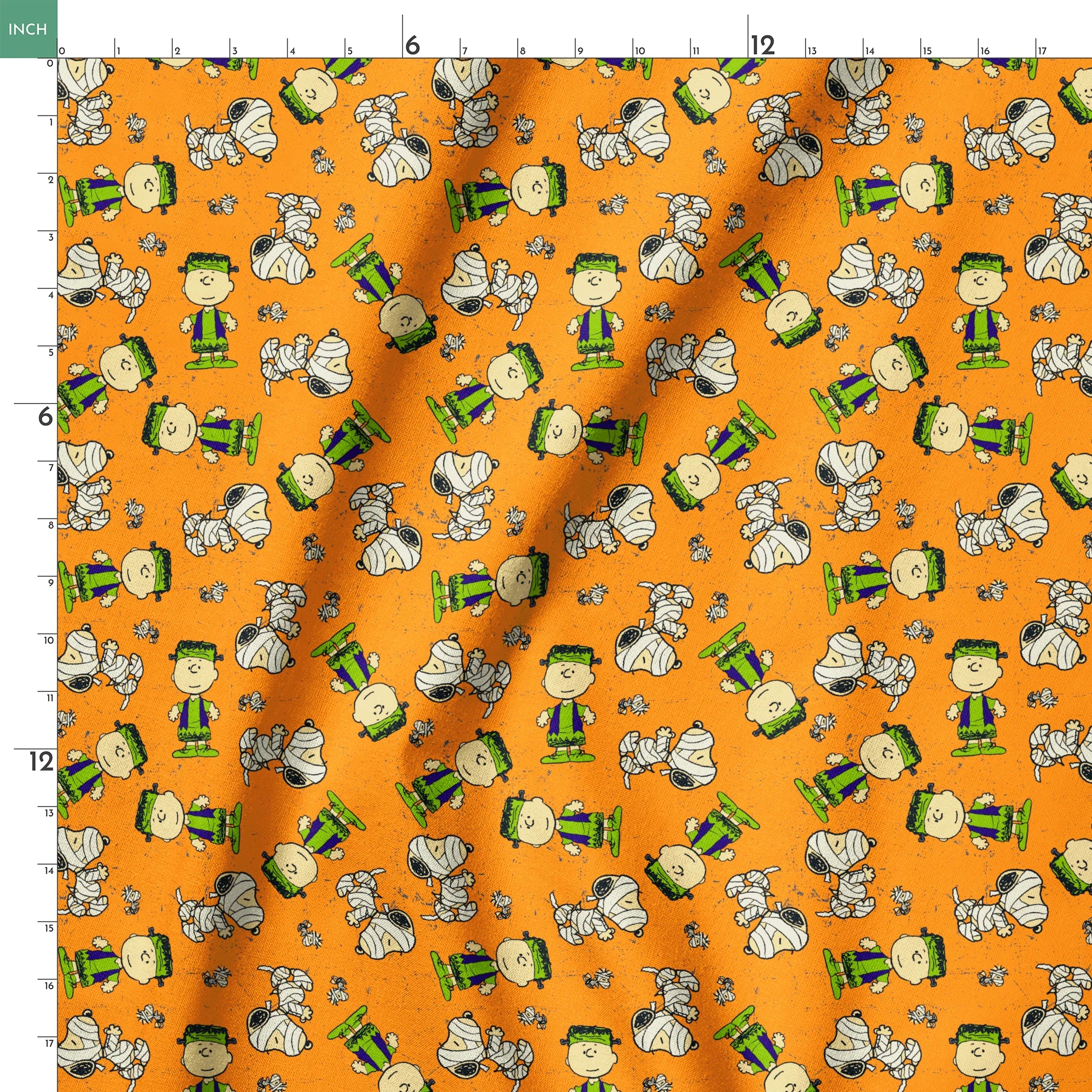 Peanuts characters pattern on orange background with Charlie Brown, Snoopy, and friends scattered throughout springs ruler 18x18