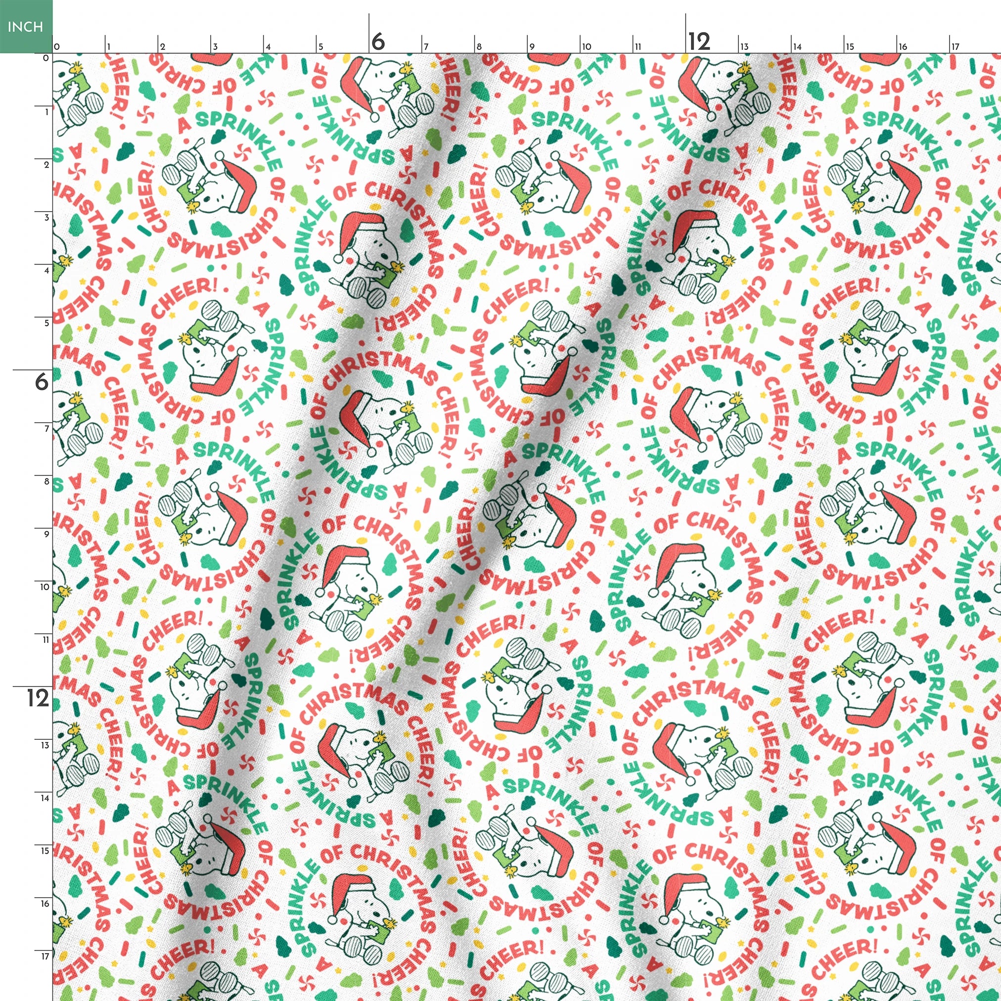 Holiday pattern with Snoopy wearing Santa hat, surrounded by "Merry Christmas", "Cheer", and candy designs on white background springs ruler 18x18