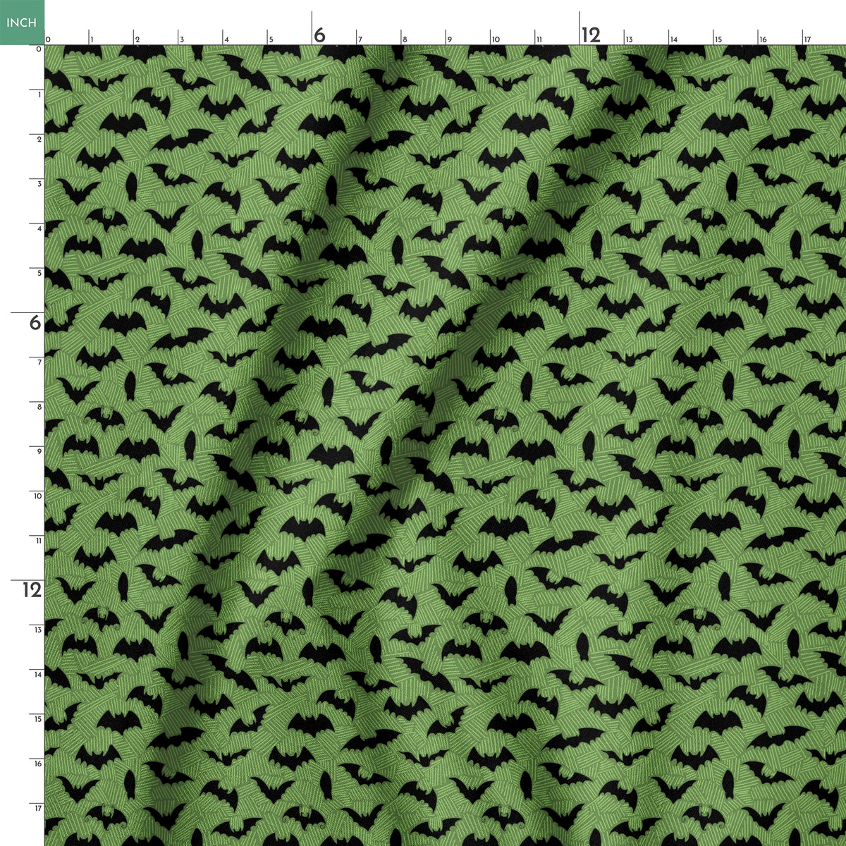 Black bat silhouettes scattered across a green textured background with zigzag pattern springs ruler 18x18