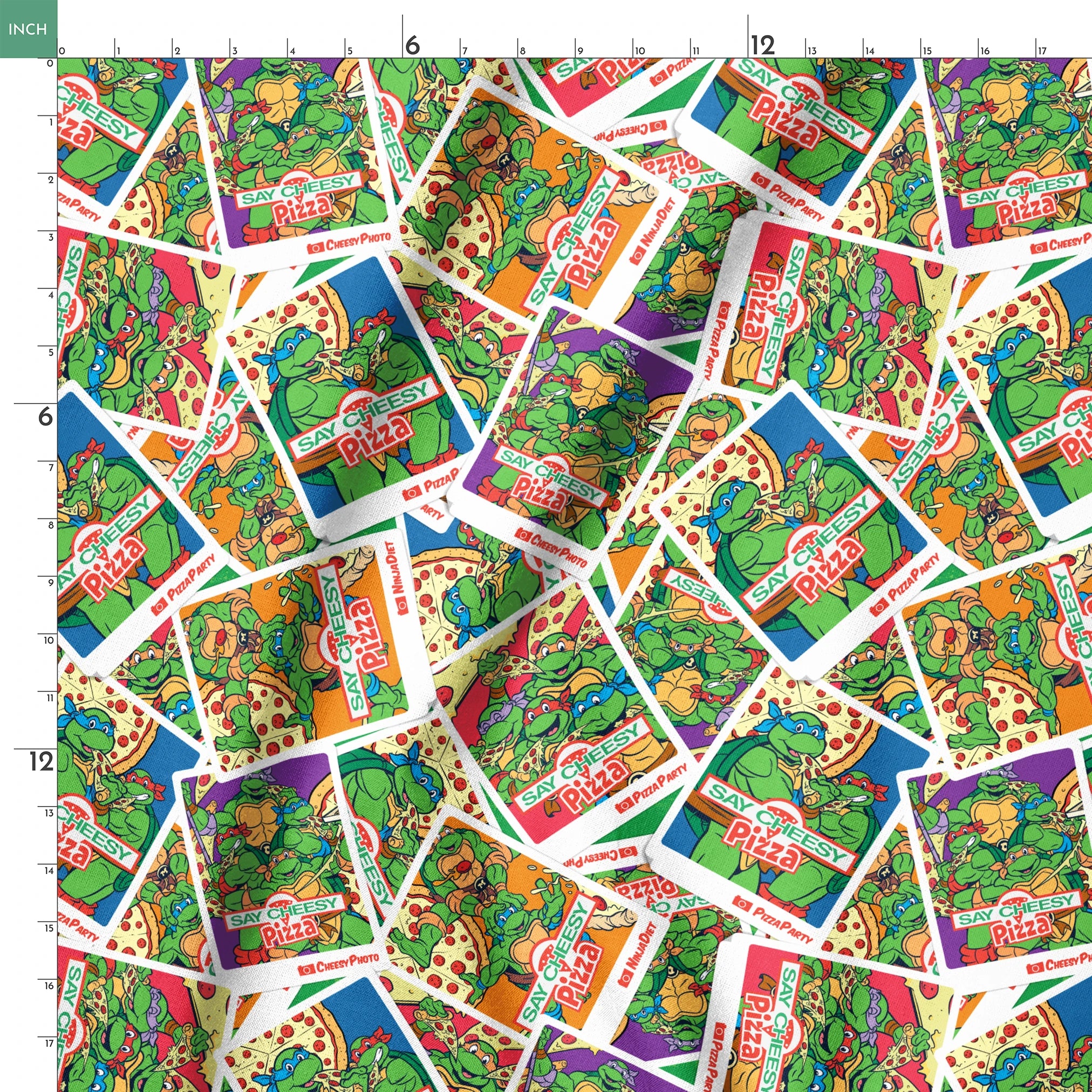 Scattered vintage Teenage Mutant Ninja Turtles trading cards with colorful comic-style artwork springs ruler 18x18