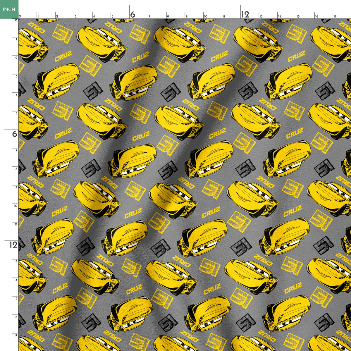 Yellow cartoon race cars with Cruz name on gray background, Cars movie pattern springs ruler 18x18