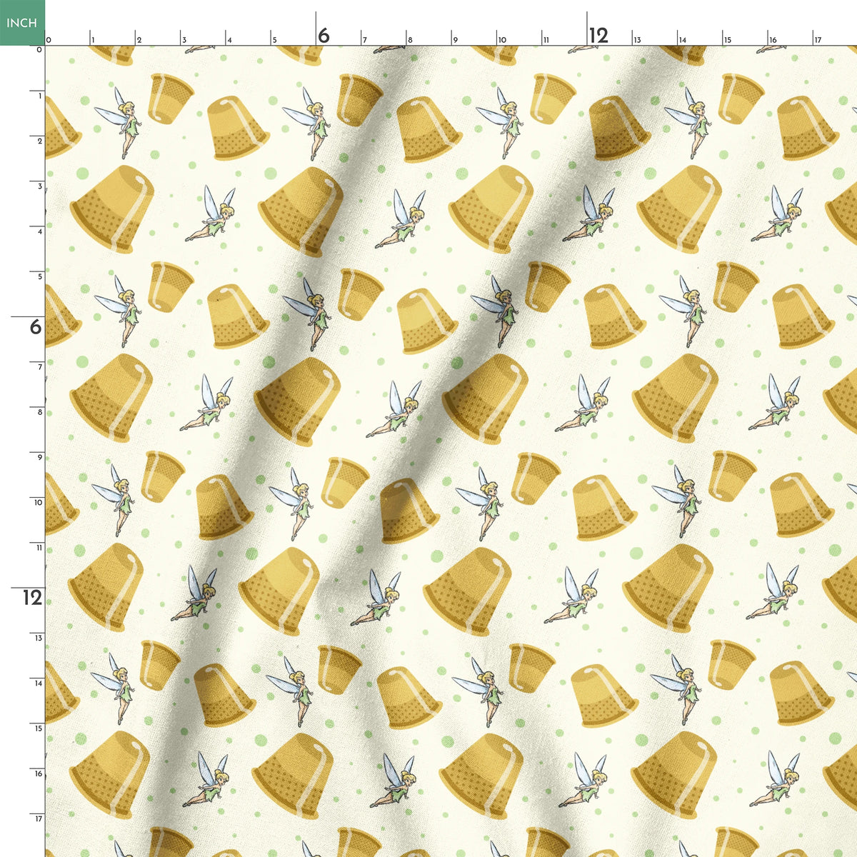 A pattern featuring Tinkerbell fairy with golden thimbles on a pale background with green dots. springs ruler 18x18