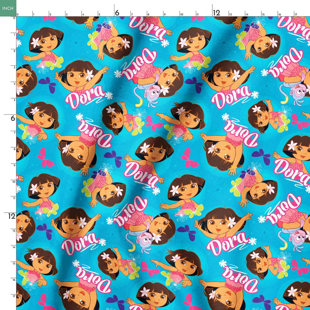 Bright blue pattern with cartoon character Dora, flowers, and "Dora" text repeated throughout springs ruler 18x18