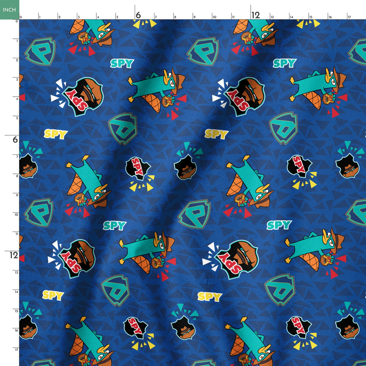 Colorful Perry the Platypus pattern with "SPY" text on blue geometric background springs ruler 18x18