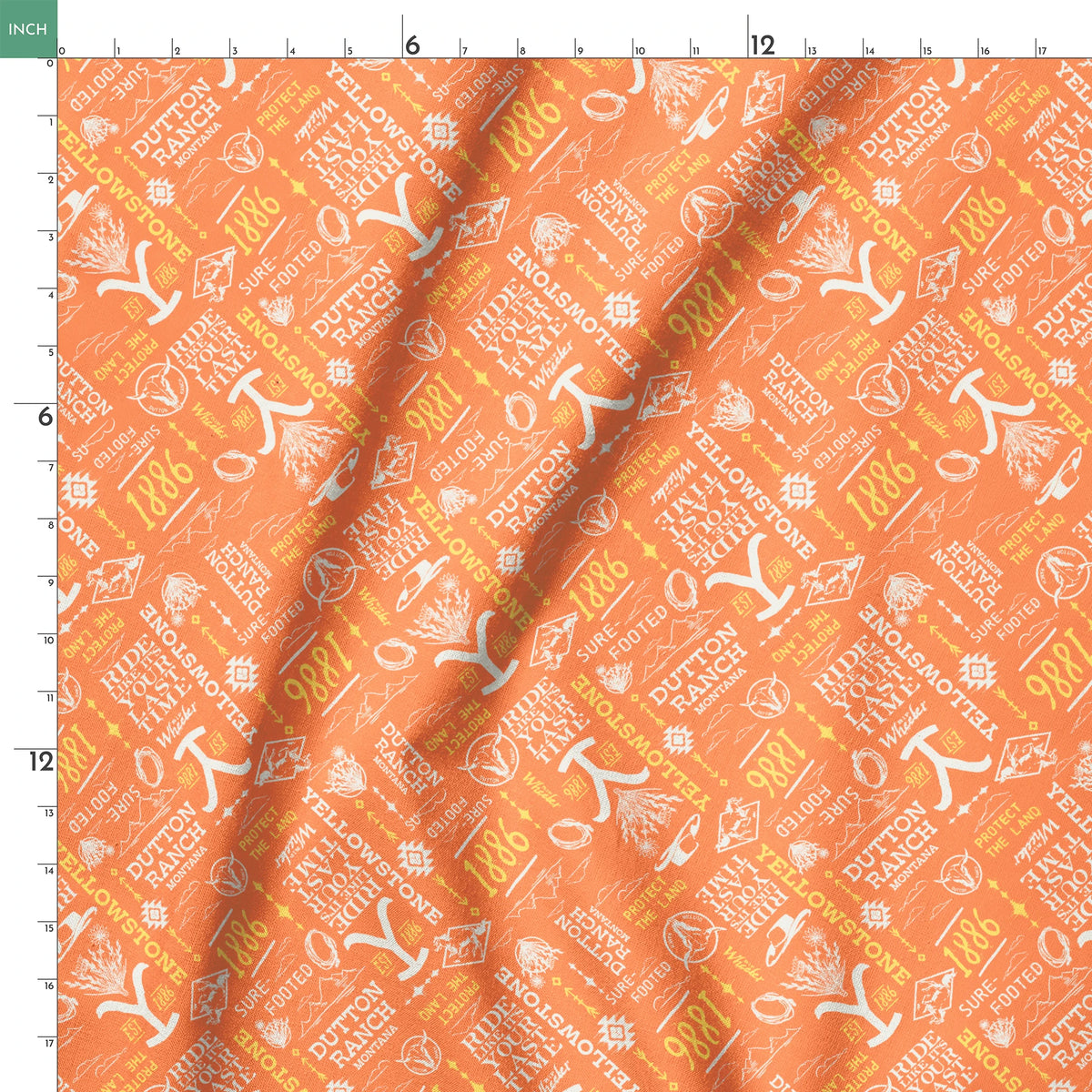 Paramount Yellowstone Verbiage Collage on Orange Fabric