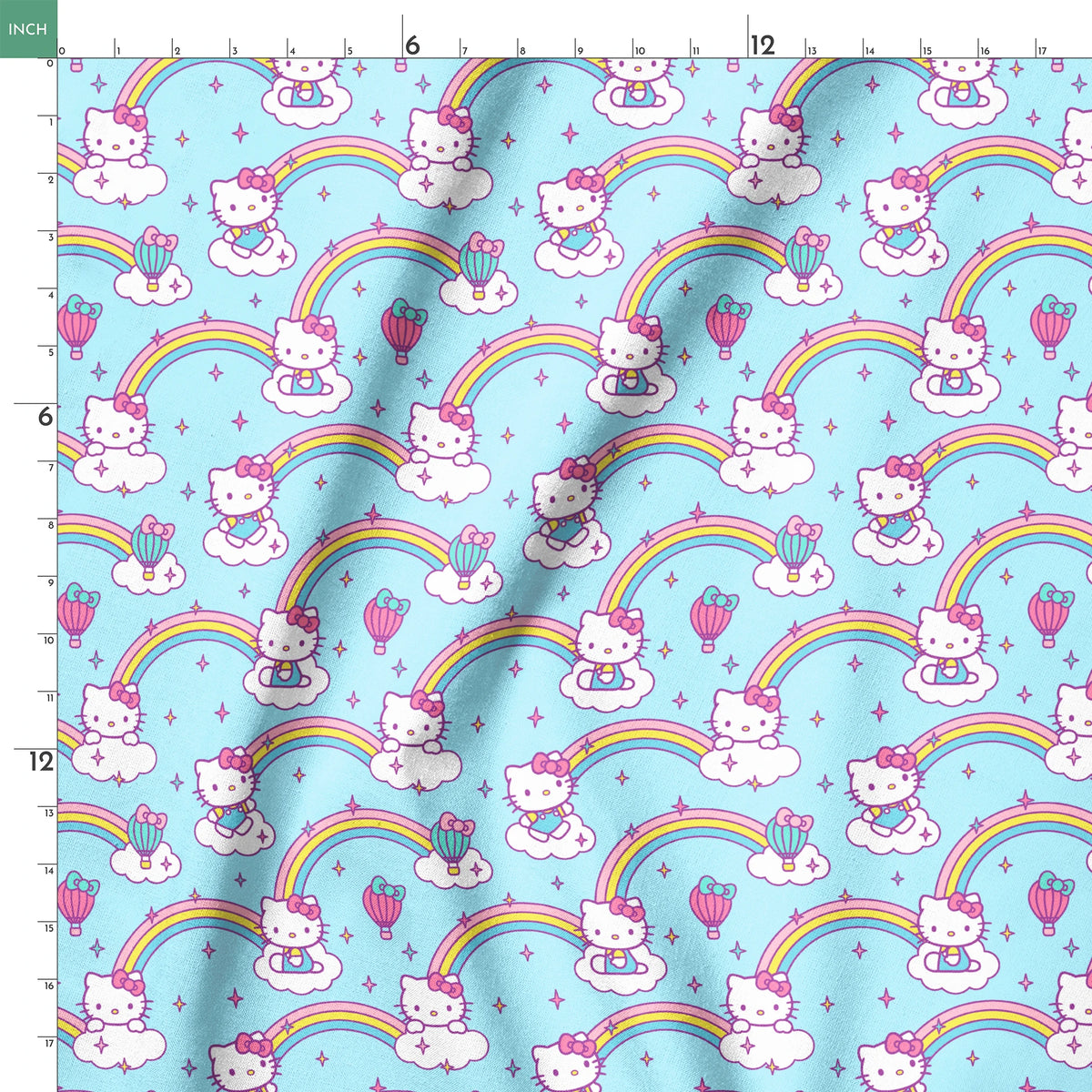 Hello Kitty® Rainbows & Clouds on Blue Fabric