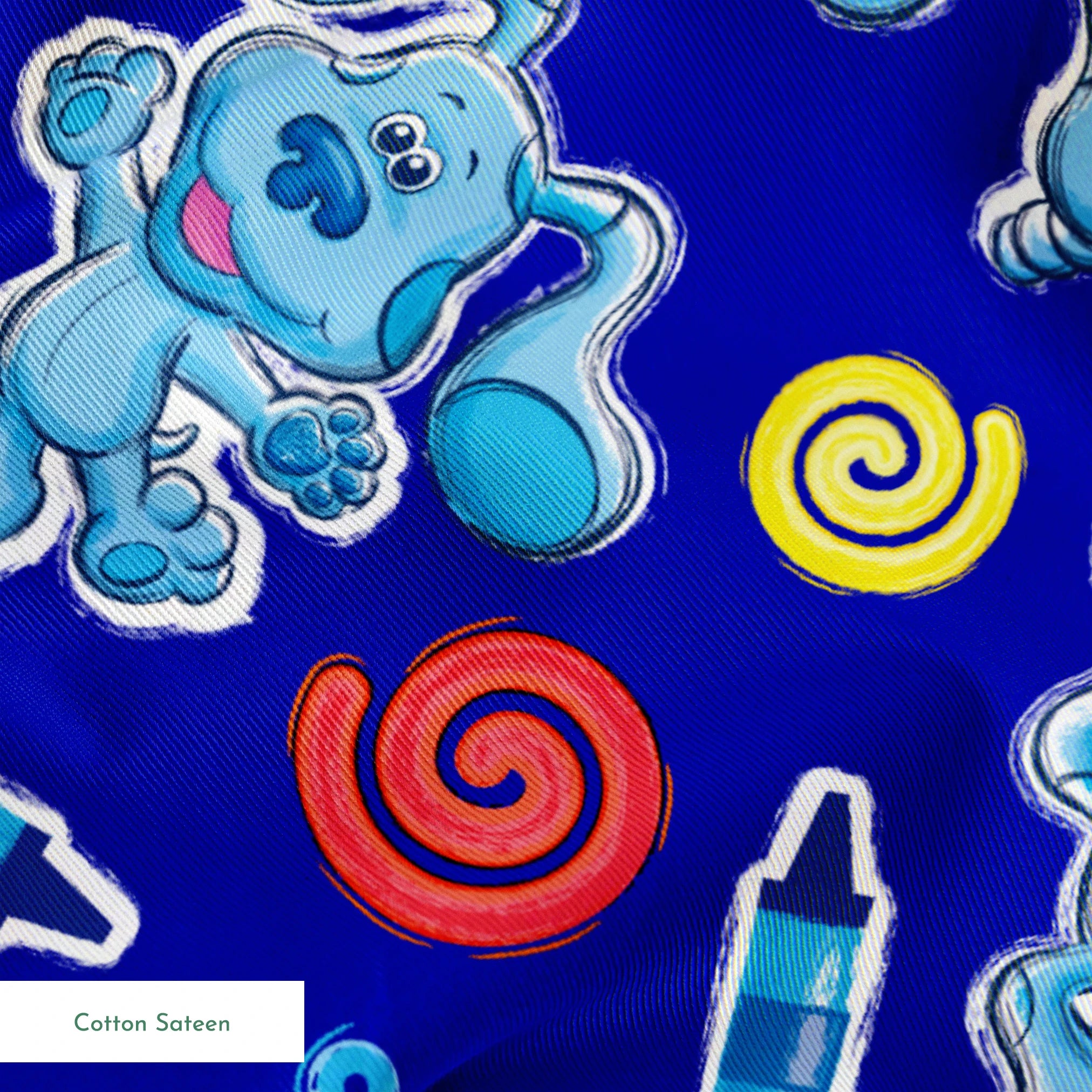 Blue background pattern with cartoon dog characters, snowflakes, spiral shapes, and thermometers in light blue, yellow, and red colors springs sateen texture