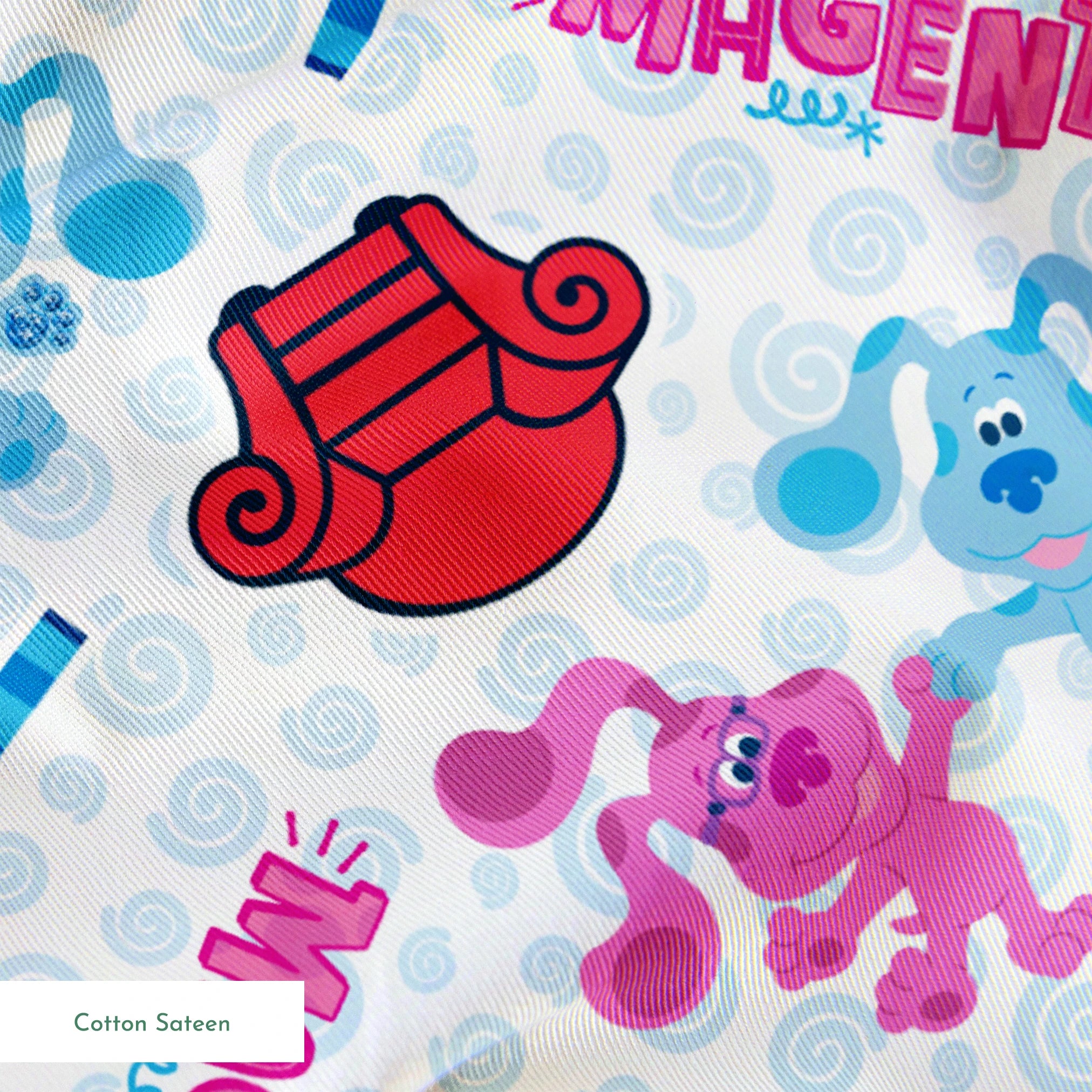 Nickelodeon, Colorful Blue's Clues pattern with blue and pink puppies, red chairs, notebooks, and crayons on a light blue background springs sateen texture