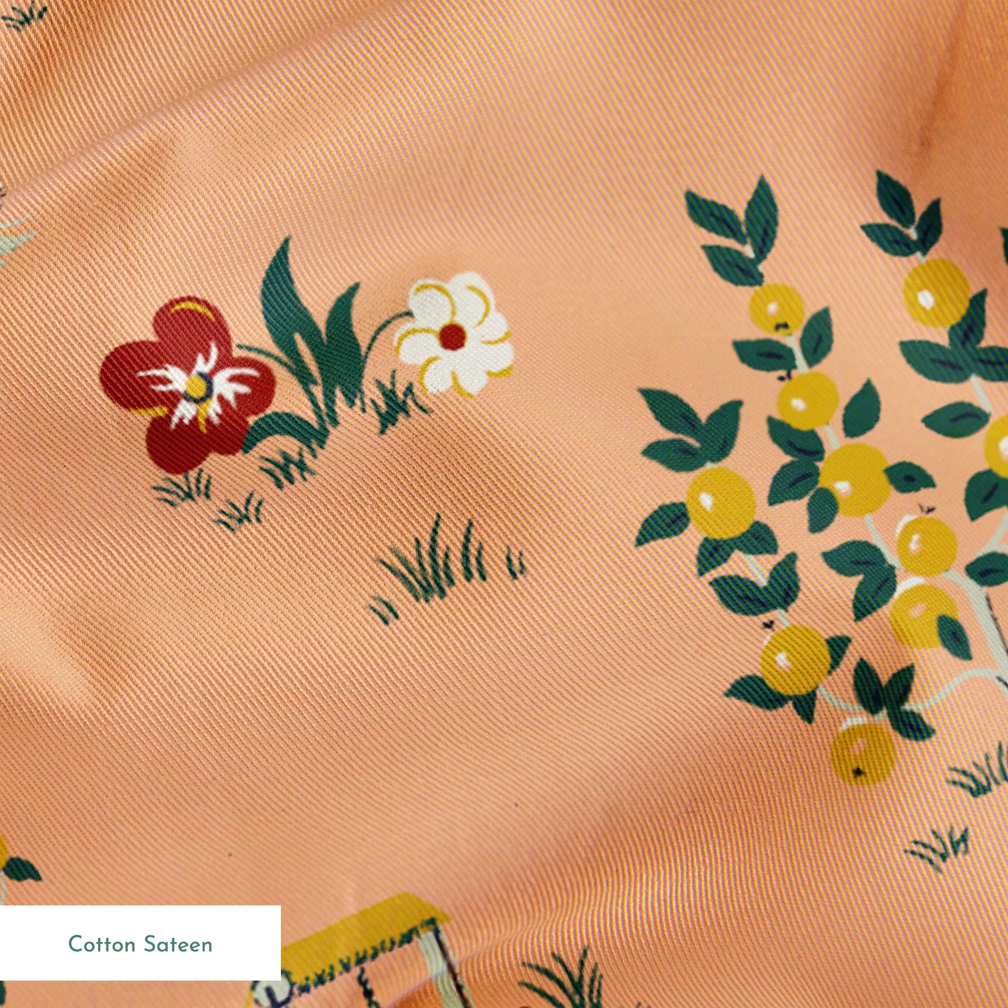 Vintage cottage scene design with houses, flowers, and animals on a peach background from the Springs Archive springs sateen texture