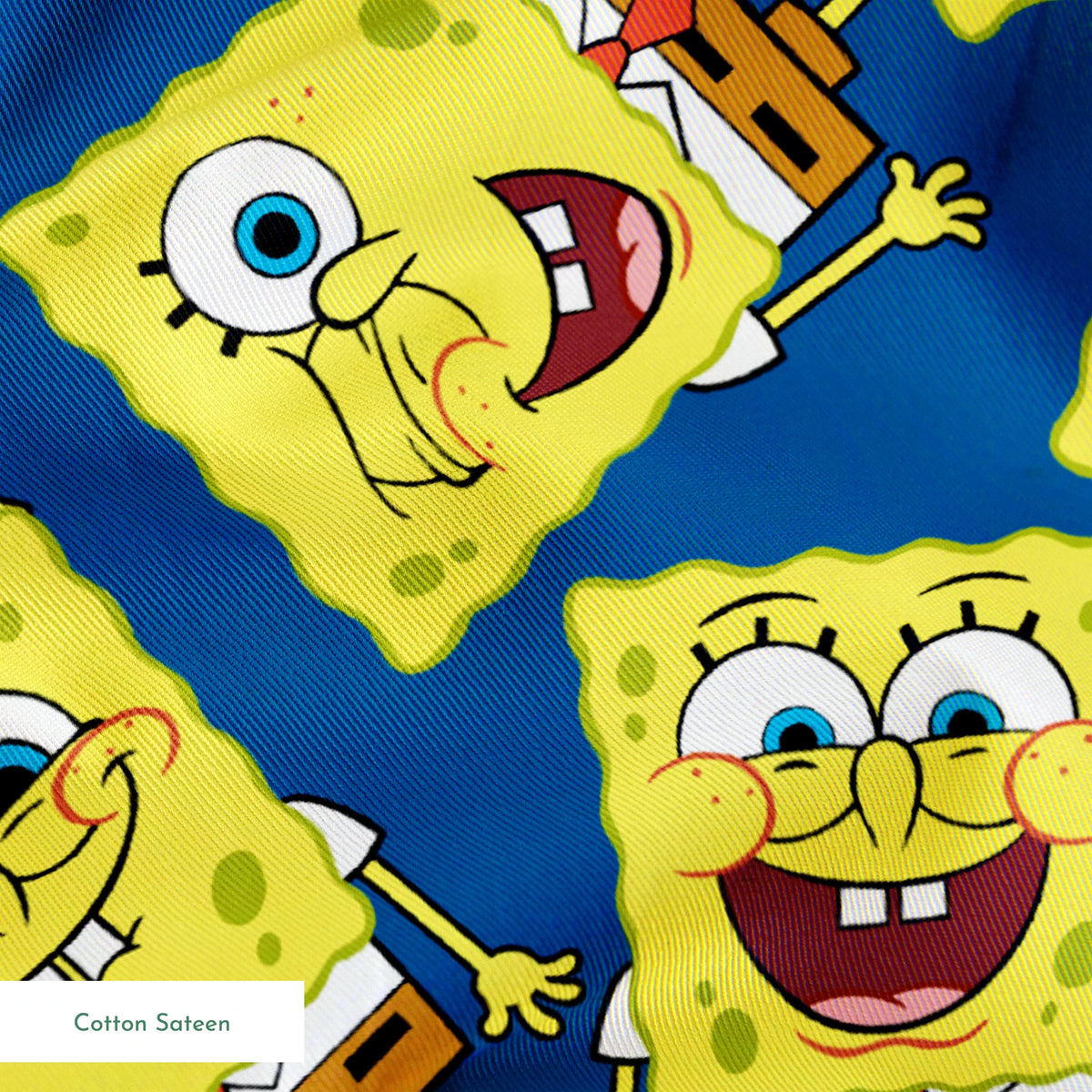 SpongeBob SquarePants pattern featuring various expressions on blue background springs sateen texture