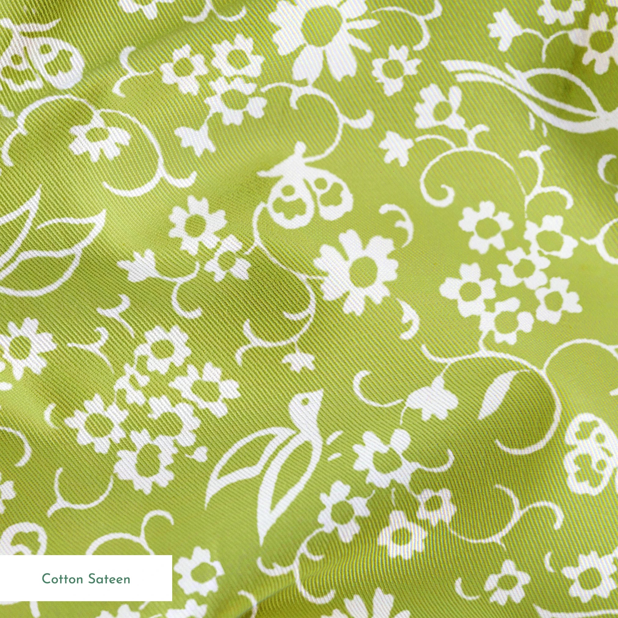 White bird and floral pattern on a vibrant lime green background. springs sateen texture