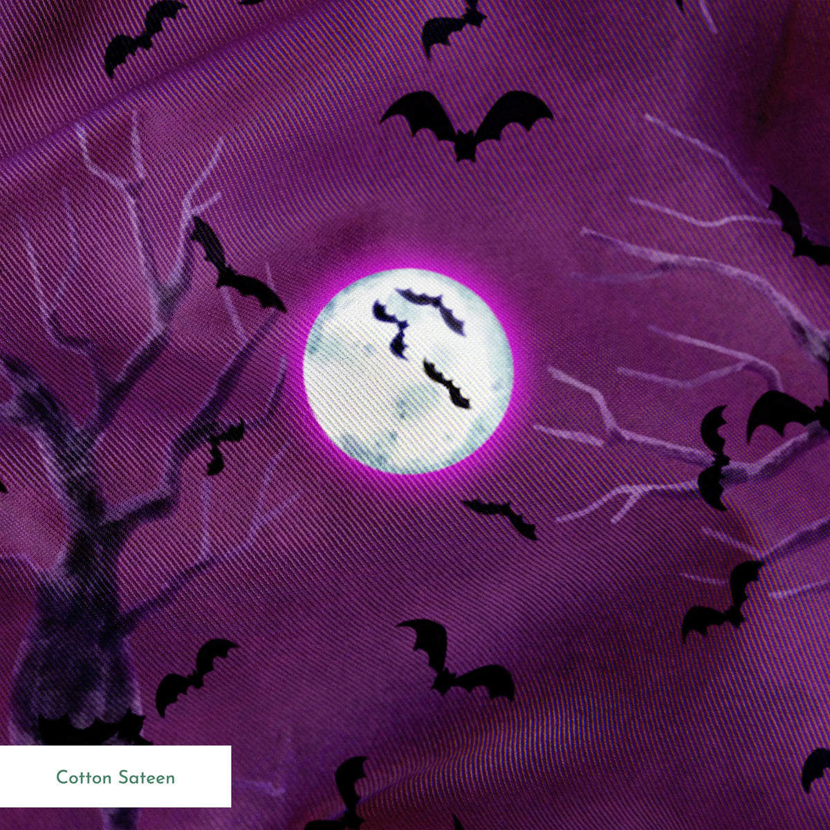 Halloween fabric design with spooky trees, bats, and glowing full moons on a purple background, illustrated by Nicole Tamarin. springs sateen texture